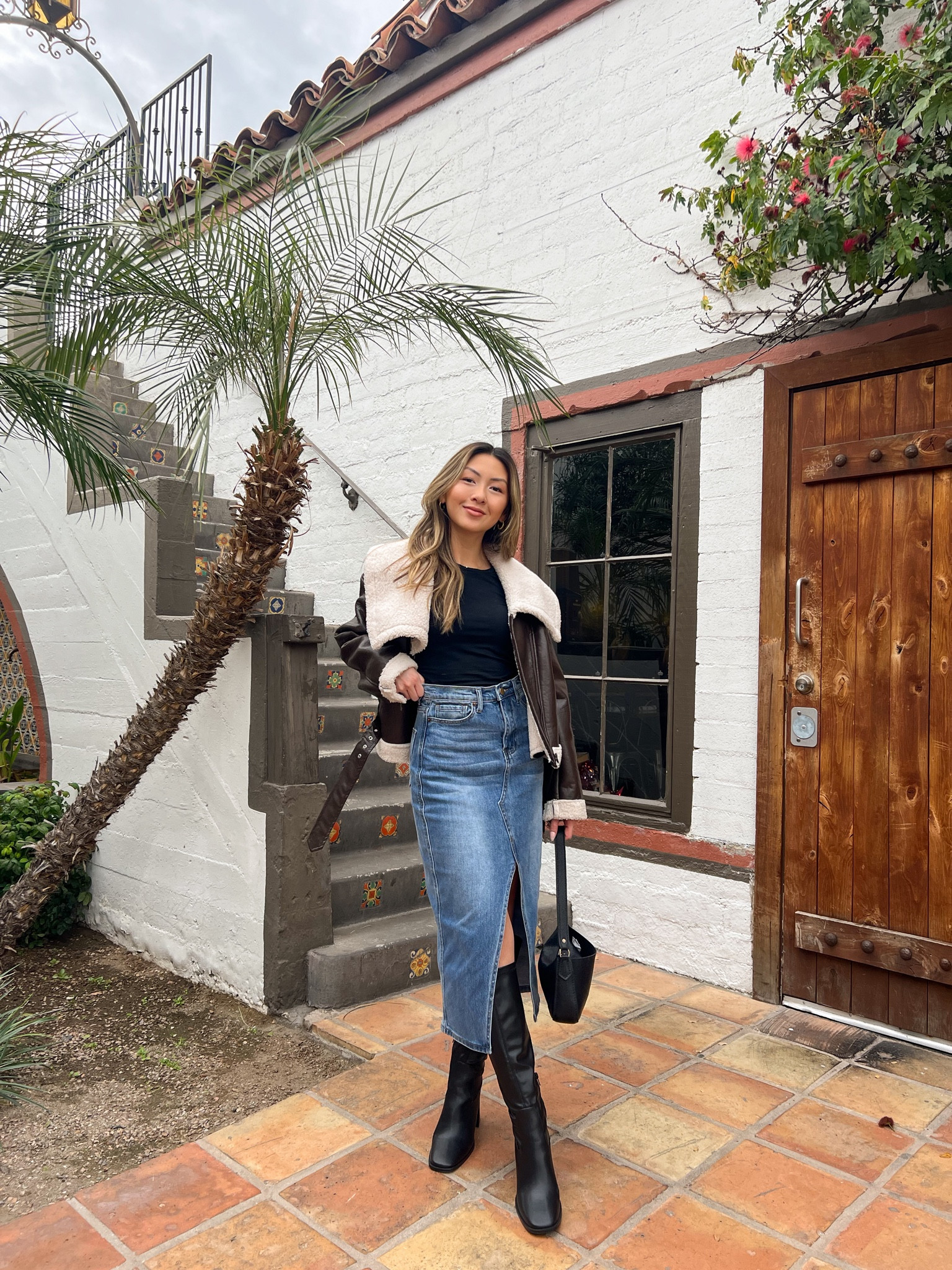brown moto jacket, denim midi skirt, black knee high boots + black shoulder bag

#LTKfindsunder100