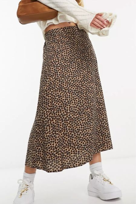 Fun Leopard Midi Skirt from Monki. Nice print, easy to style with a band tee and white sneakers. Obsessed with this fall piece 😍🍂 #monki #leopard #skirt #fall #autumn 

#LTKSeasonal #LTKstyletip #LTKfindsunder50