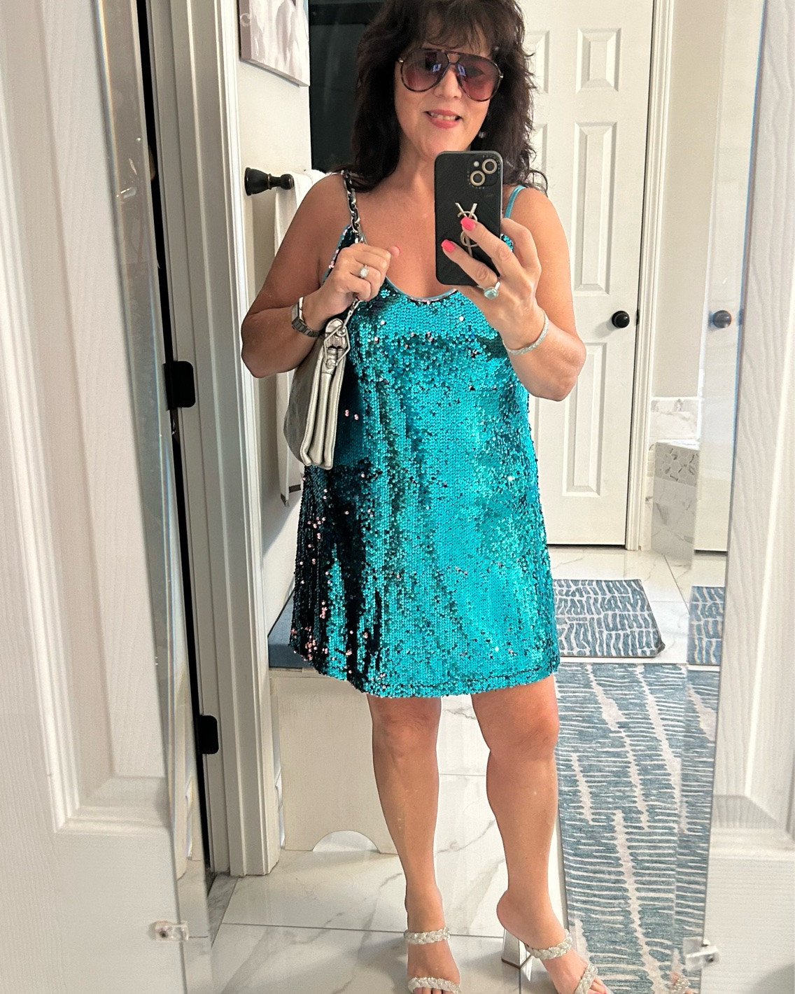 Are you going to a wedding or a special event? These dresses are perfect, they come in so many colors. Who doesn’t love a little sparkle? #WeddingGuestDress #SummerDress #SummerFun #SparkleDress #AgelessFashion.

#LTKgrwm #LTKWedding #LTKMidsize