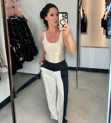 Love these pants from Akira. White and black twist on the classics. Slightly see though on the back wear with nude or white underwear! 
And a bodysuit from Target that goes with everything! 

#LTKfindsunder100 #LTKstyletip #LTKfindsunder50