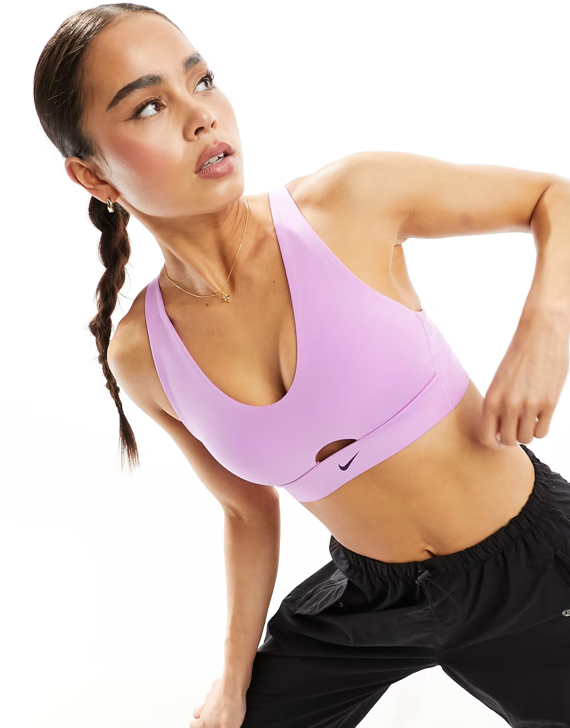 Nike Training Indy Dri-Fit plunge cutout medium support sports bra in purple | ASOS (Global)