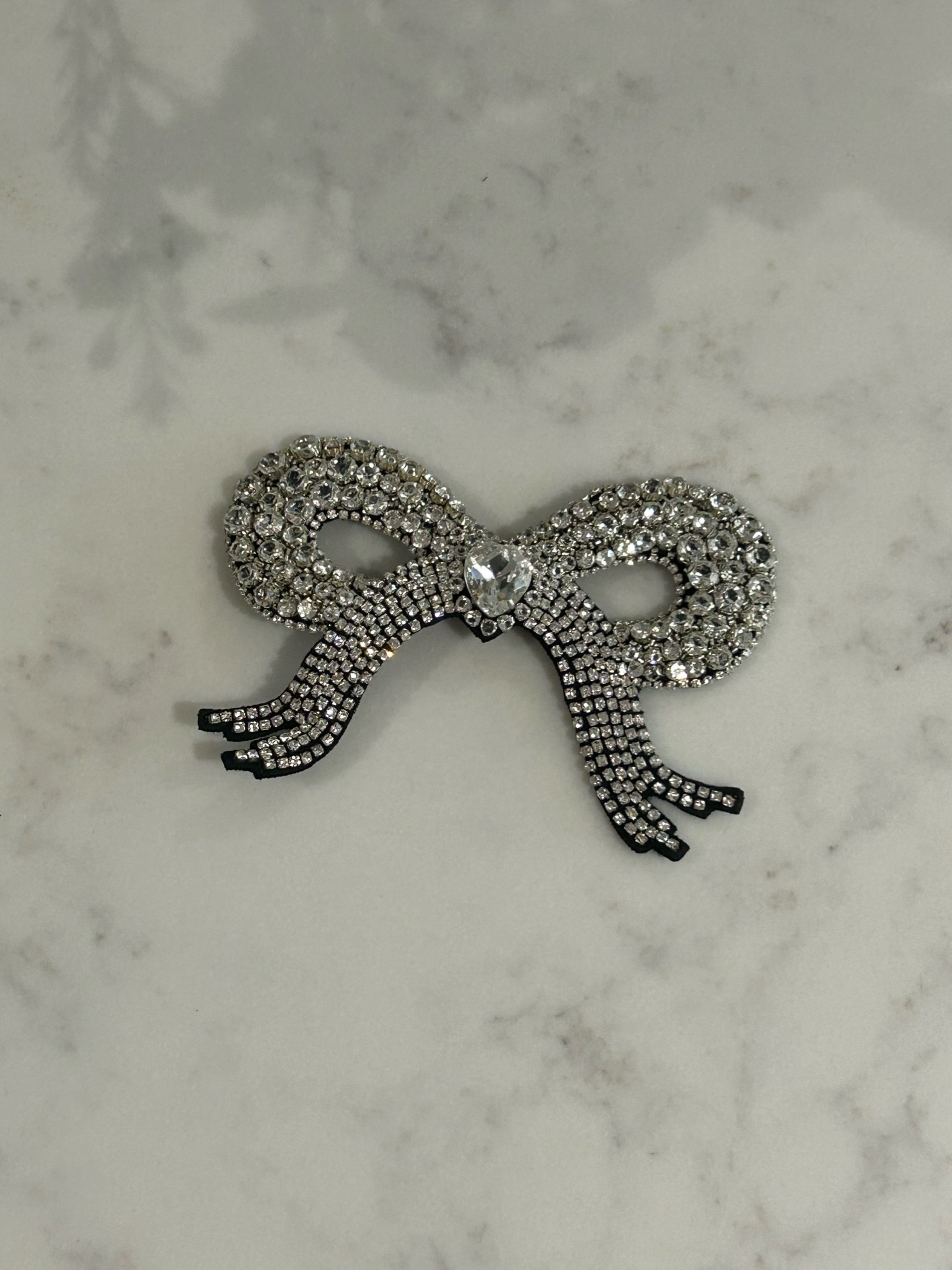 The easiest way to jazz up an outfit for party season: a crystal-embellished bow hair clip (plus it’s on sale) 🎀 

#LTKluxury #LTKgiftguide #LTKpartywear
