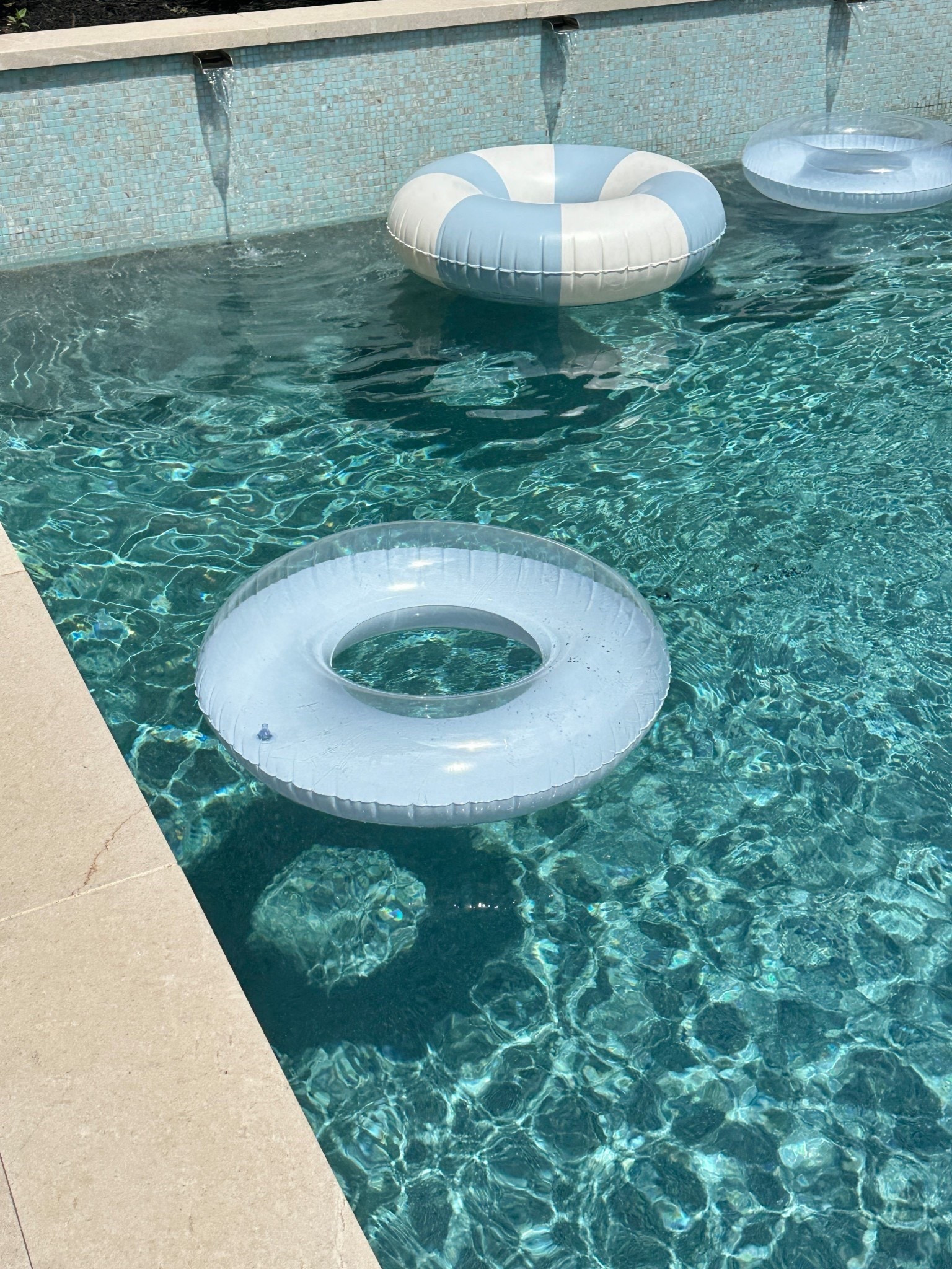 Favorite cabana stripe pool rings are back 💙 blue tubes pool floats aesthetic pool inflatables 

#LTKSwim #LTKHome #LTKSaleAlert