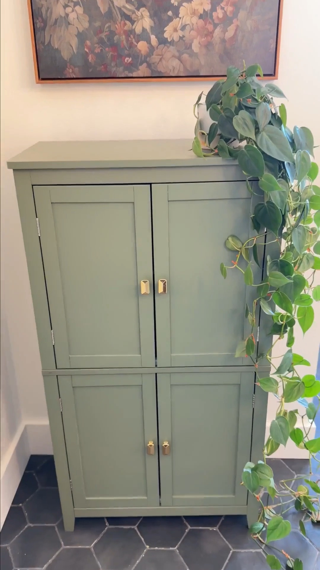 A beautiful storage piece can do so much more than just hide the clutter. 🤎✨

I love how a deep green cabinet can bring color and character into an otherwise simple space while adding the practical storage we all need. That combination of pretty and functional is always a win.

You don’t have to completely renovate a room to give it a more finished, custom feel. Sometimes one thoughtful piece is enough to add warmth, personality, and a little extra charm. 🌿

Proof that even the most everyday spaces can feel special with the right details. 🤍

#LTKHome #LTKmomlife #LTKdayinmylife