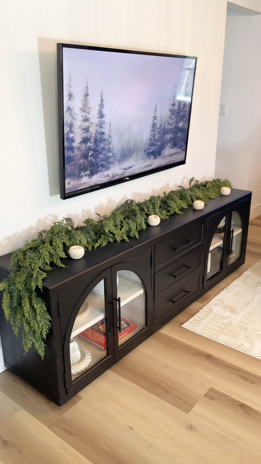 Tv stand garland 

#LTKSeasonal #LTKFindsUnder50 #LTKHome