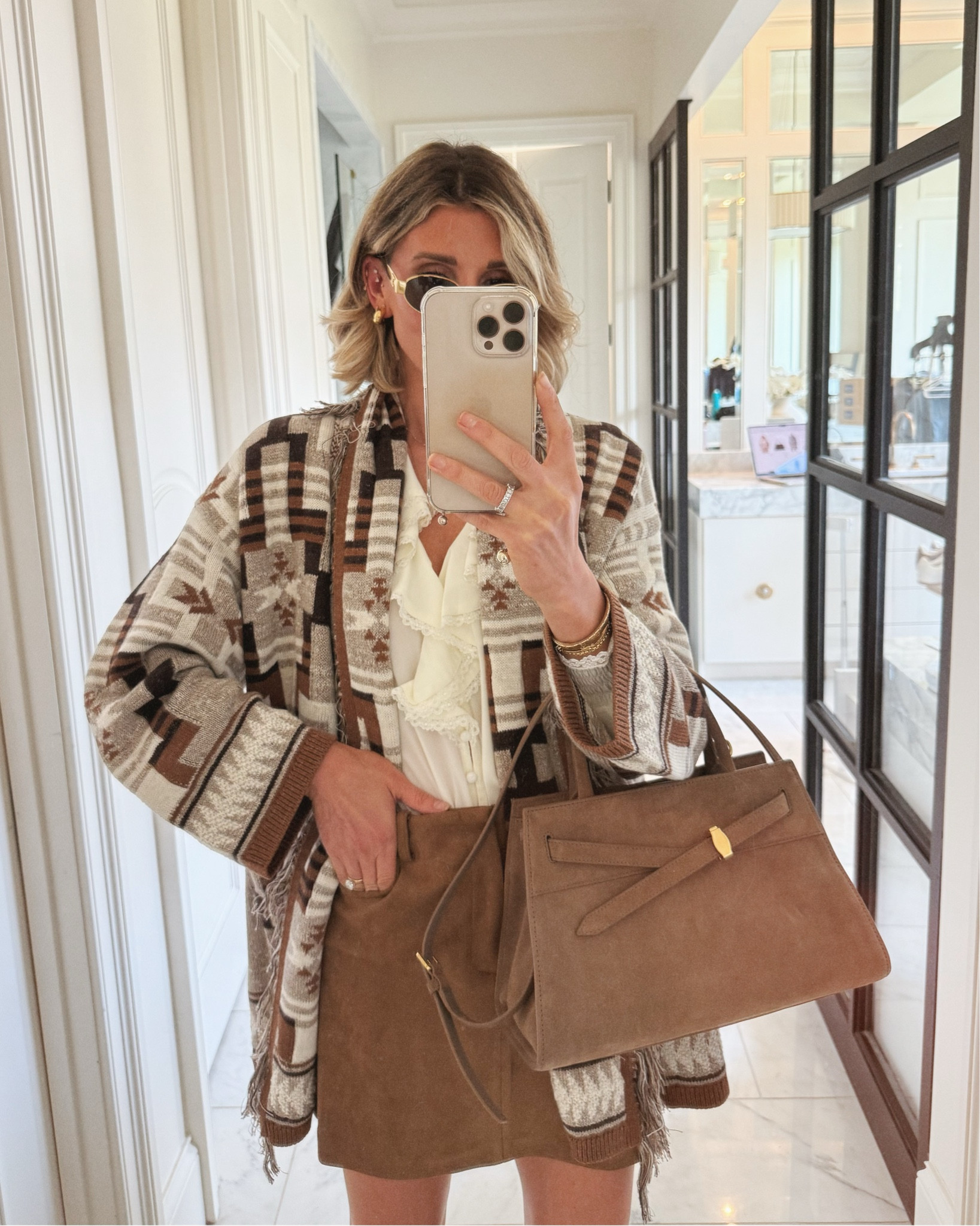 Love this pre fall outfit. Perfect for a country concert. I'm wearing size small in my top, skirt and cardigan. @bloomingdales #bloomingdales #ad