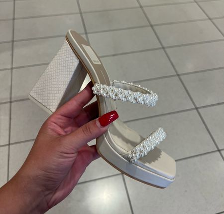 These white heels are SO CUTE!!!! perfect for spring and summer!!! I just love the pearl detail!! #shoes #heels #sandals 

#LTKFind #LTKshoecrush #LTKwedding
