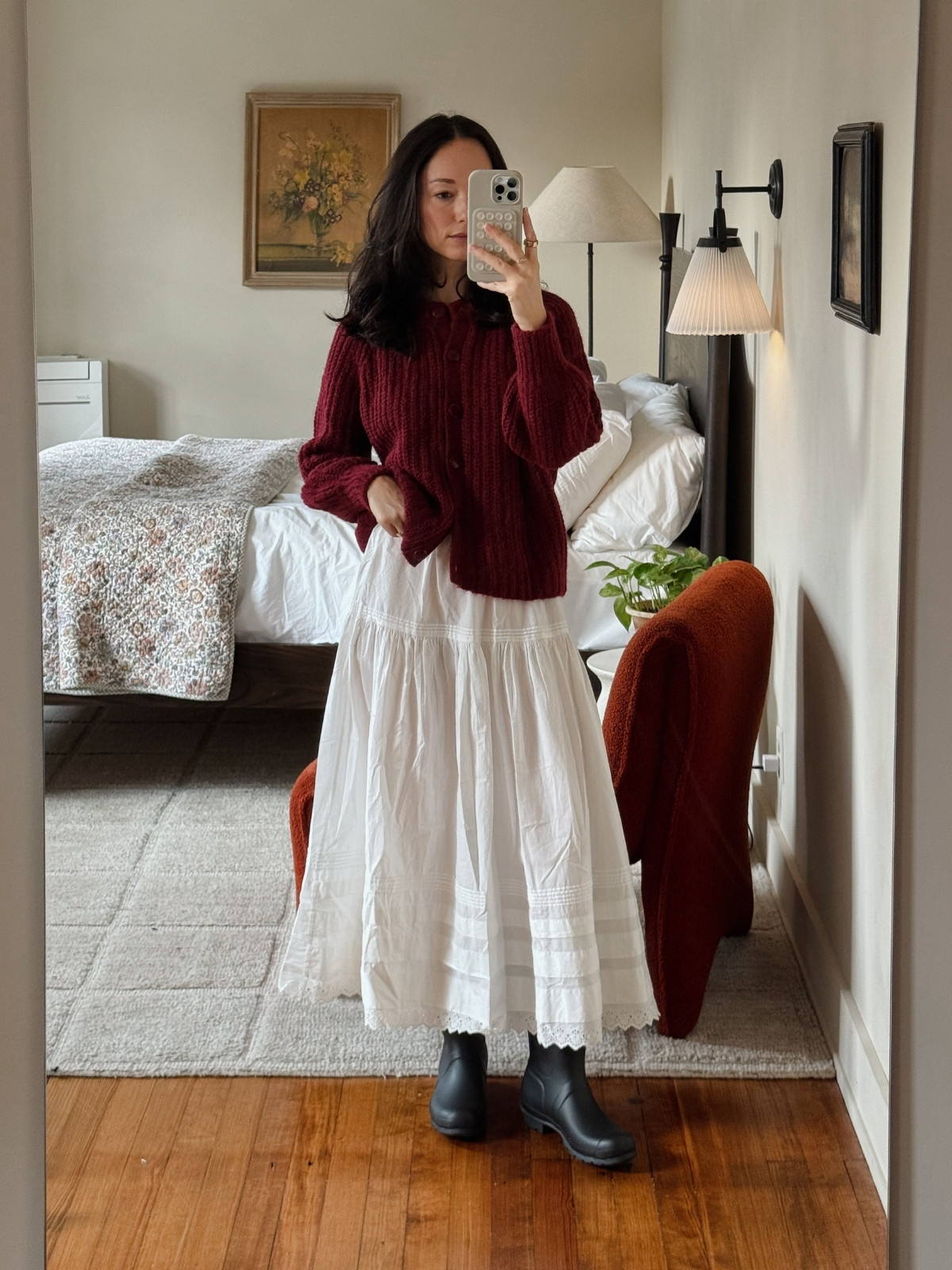 A comfy fall or winter outfit. Featuring a white maxi skirt, hunter rain boots, and a burgundy cardigan 

 #LTKootd #LTKSeasonal #LTKFindsUnder100
