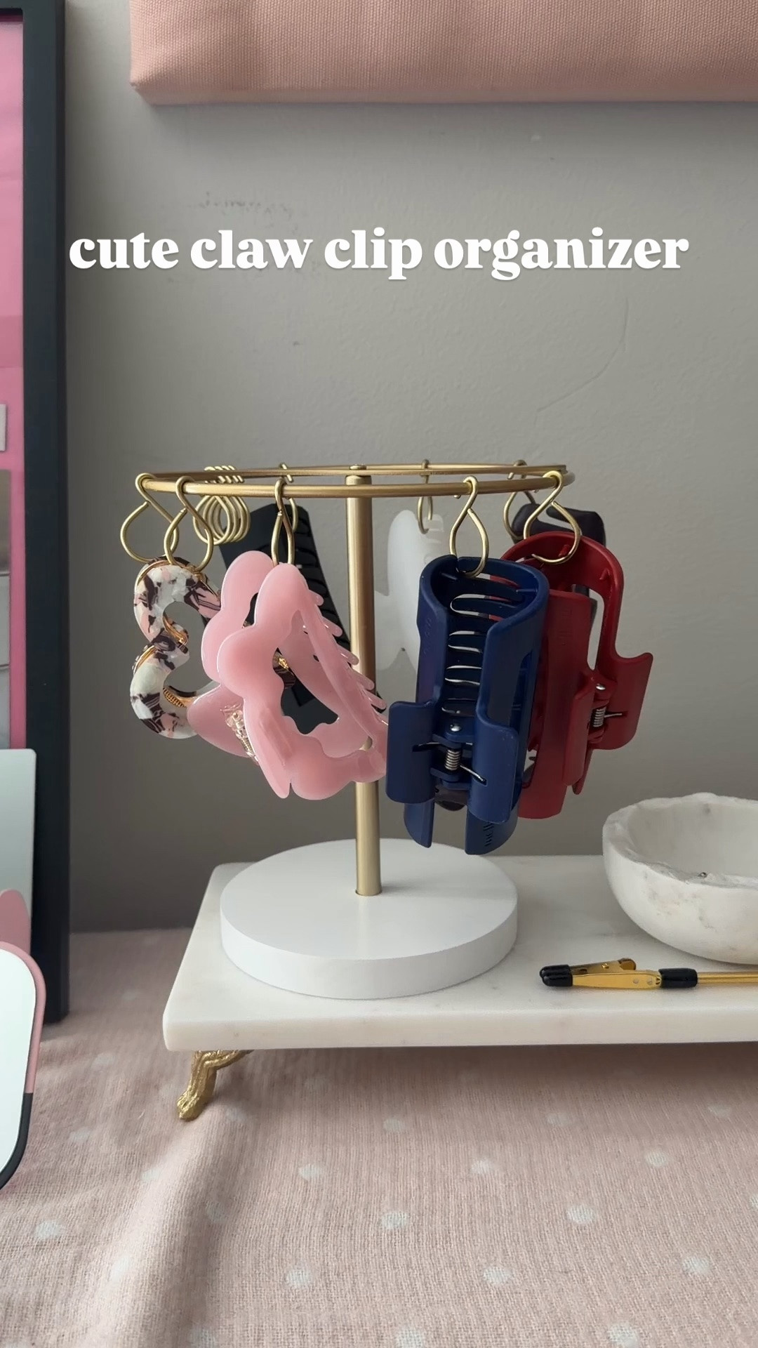 Found this hanging claw clip organizer to finally get my clip collection sorted and off my dresser. It holds so many clips and makes it easy to see what I have while keeping the space looking neat and uncluttered.

#LTKdayinmylife #LTKHome #LTKWorkwear