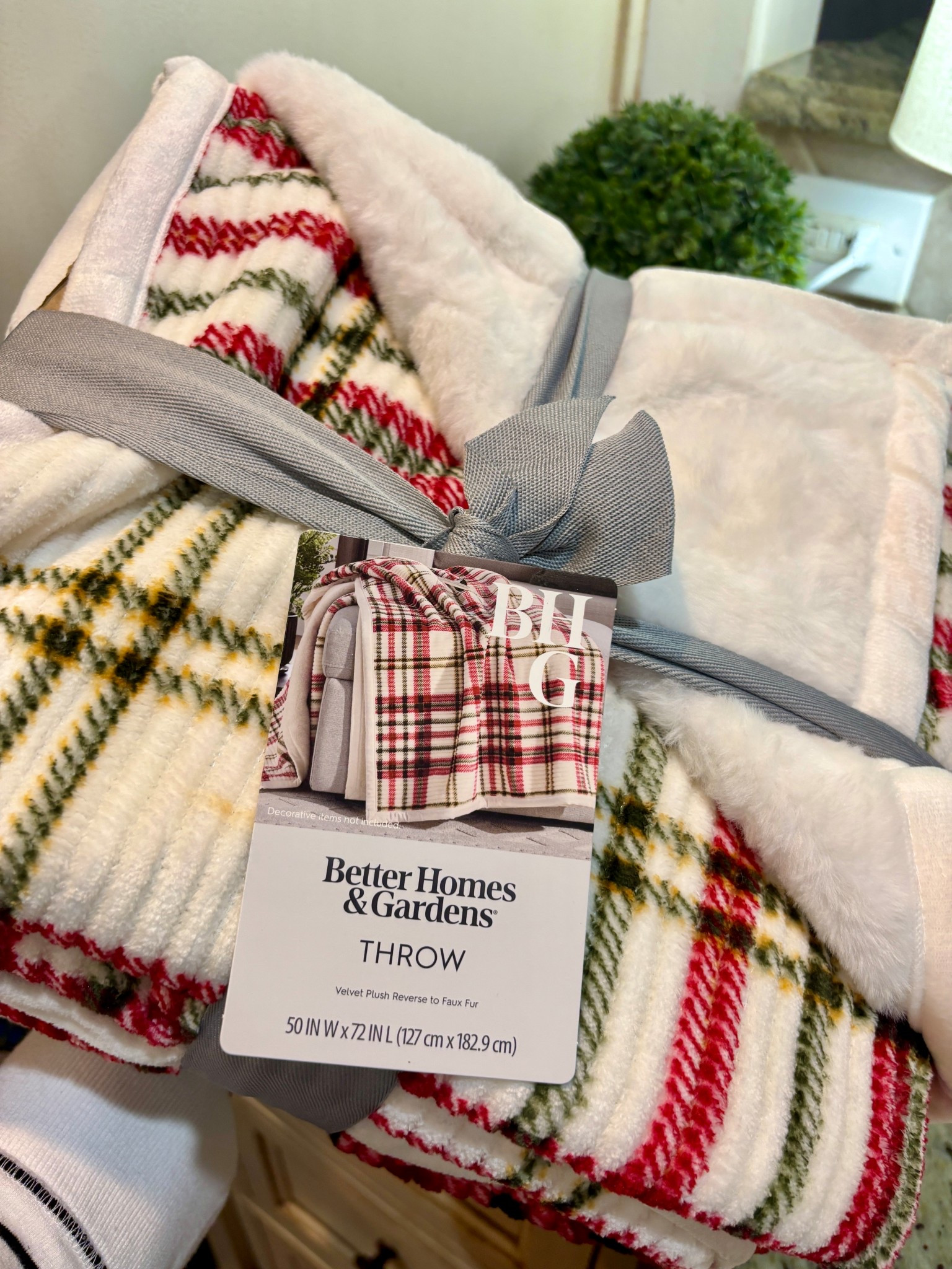 The softest holiday throw by “Better Homes & Gardens.” She’s reversible too! 🎄 

#LTKHoliday #LTKFamily #LTKHome