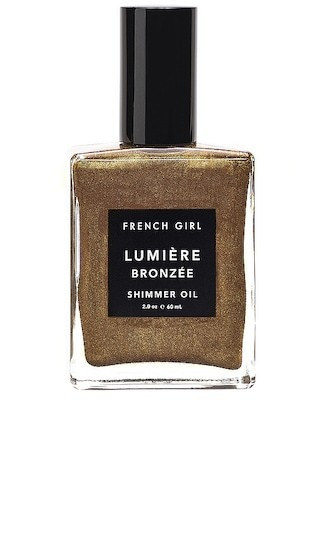 French Girl Lumiere Bronze Shimmer Oil in Metallic Bronze. | Revolve Clothing (Global)
