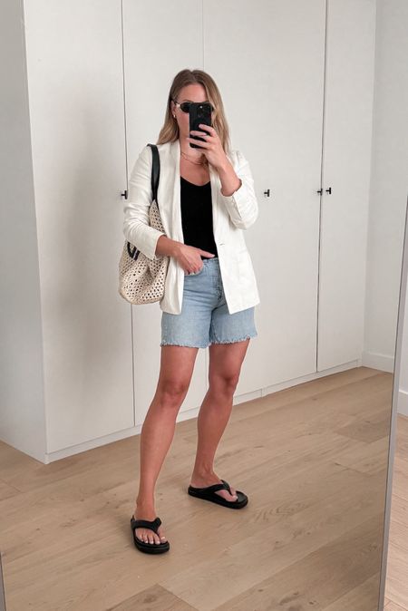 For an effortless spring or summer look, style your white blazer with denim shorts and platform sandals. 

Women's fashion, women's outfit idea, outfit inspo, trending fashion, how to style a blazer, white blazer fashion, classic fashion, chic fashion

#LTKSeasonal #LTKstyletip