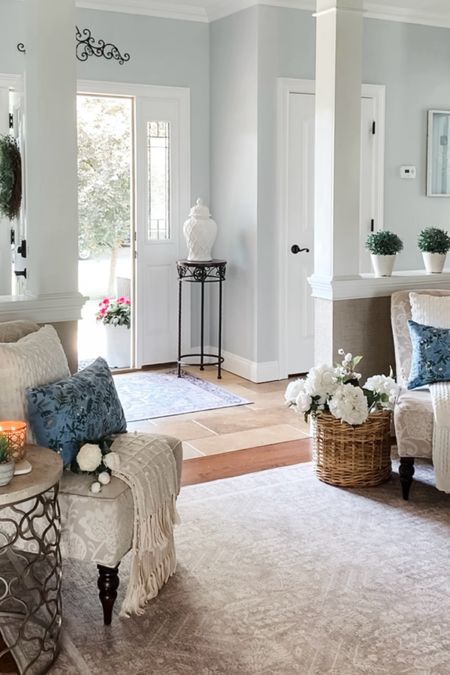 Summer entryway styling! Shop area rugs, throw pillows, throw blankets, florals, baskets, side chair, lamp candles. Summer home decor accessories. Sales. 

#LTKFindsUnder50 #LTKHome #LTKSaleAlert