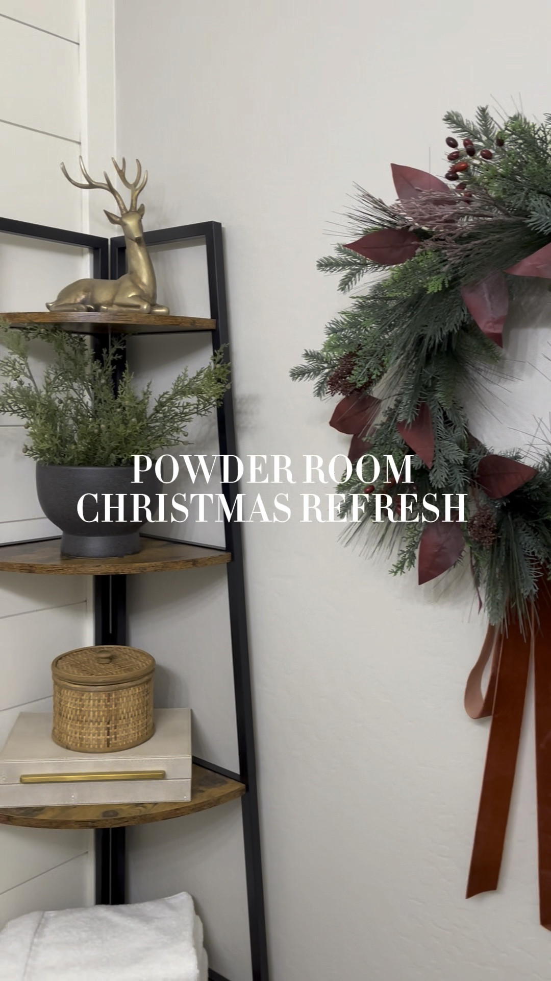 Powder room Christmas refresh!  Follow @a.firemans.wife on Instagram for more inspiration. 
The Santa artwork is a digital download that I had printed at Walgreens. 

Eucalyptus Ribbon Artificial Wreath | gold deer decor |  Red Reindeer Framed Canvas | Sleigh Bell Reversible Jacquard Towel | Santa artwork digital download | cedar garland | 5 tier tall corner shelf 

#LTKHoliday #LTKHome #LTKVideo