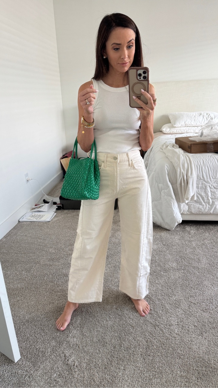 Monochrome summer outfit with high waisted, ecru barrel pants a classic white tank and pop of color with this green woven bag.

#LTKootd #LTKTravel #LTKSeasonal