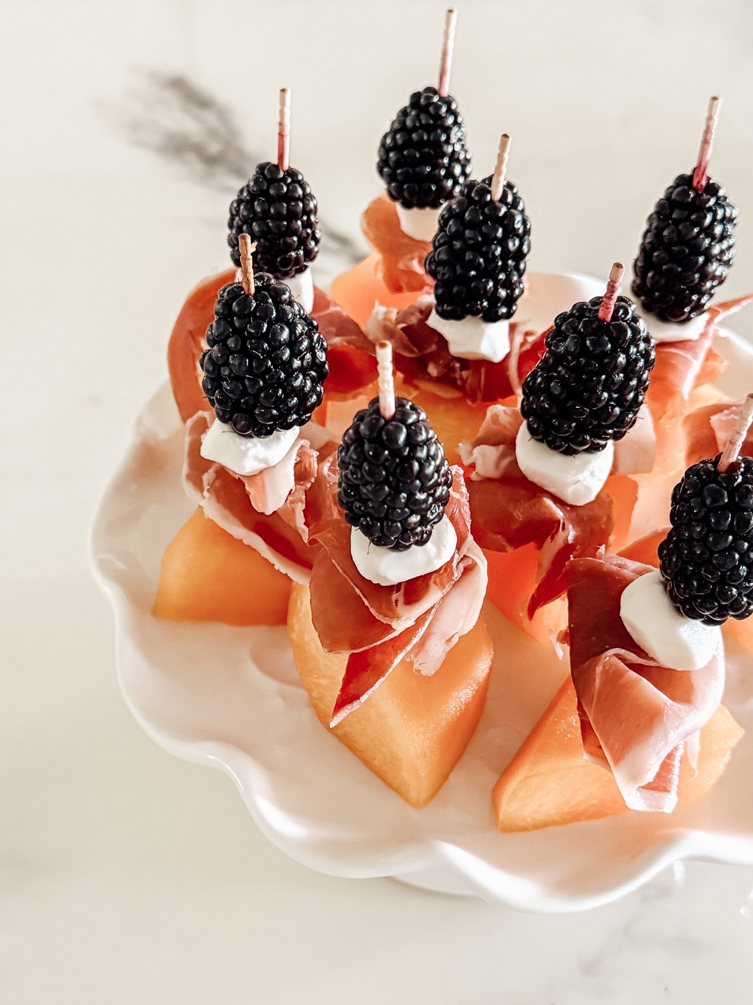 Blackberry Prosciutto Cantaloupe Skewers are the perfect mix of Sweet and Savory! #easyappetizers #appetizerskewers

#LTKSeasonal #LTKHome #LTKParties