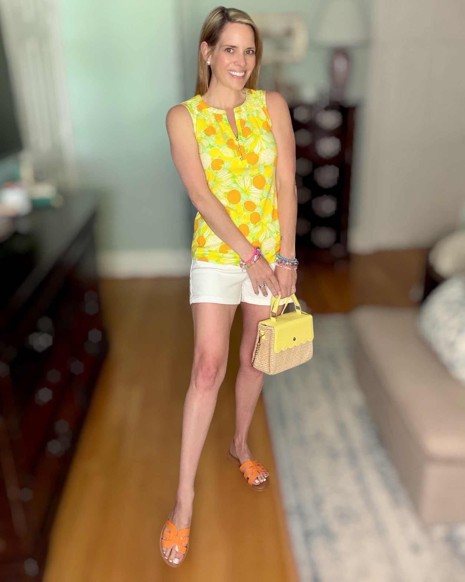 🍋 Citrus Summer Style 🍋

Bright, cheerful, and ready for sunshine! This citrus-print Essie knit top brings all the summer vibes with its vibrant lemon and orange pattern, paired with crisp white shorts for a fresh, polished look. Finished with colorful beaded bracelets, fun orange sandals, and the sweetest woven handbag for a playful pop of color. ☀️🧡🍊

This outfit is perfect for summer vacations, brunch dates, farmers markets, coastal getaways, and everyday warm-weather adventures. Lightweight, colorful, and effortlessly preppy!

summer outfit ideas, citrus print top, colorful preppy style, lemon print fashion, orange print top, white shorts outfit, resort wear inspiration, vacation style, bright summer outfit, woven handbag, colorful accessories, casual chic outfit, classic summer fashion, women’s summer trends, vacation ready look 🍋✨🌴🧡

#LTKOver40 #LTKPetite #LTKootd
