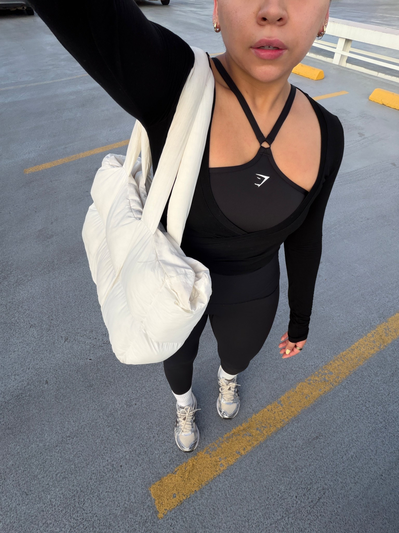 Sports bra: old, linked similar 
Wrap top: small
Leggings: medium 
Grip socks
Sneakers: 6.5 women 
Puffer tote bag 

#LTKgrwm #LTKActive #LTKootd