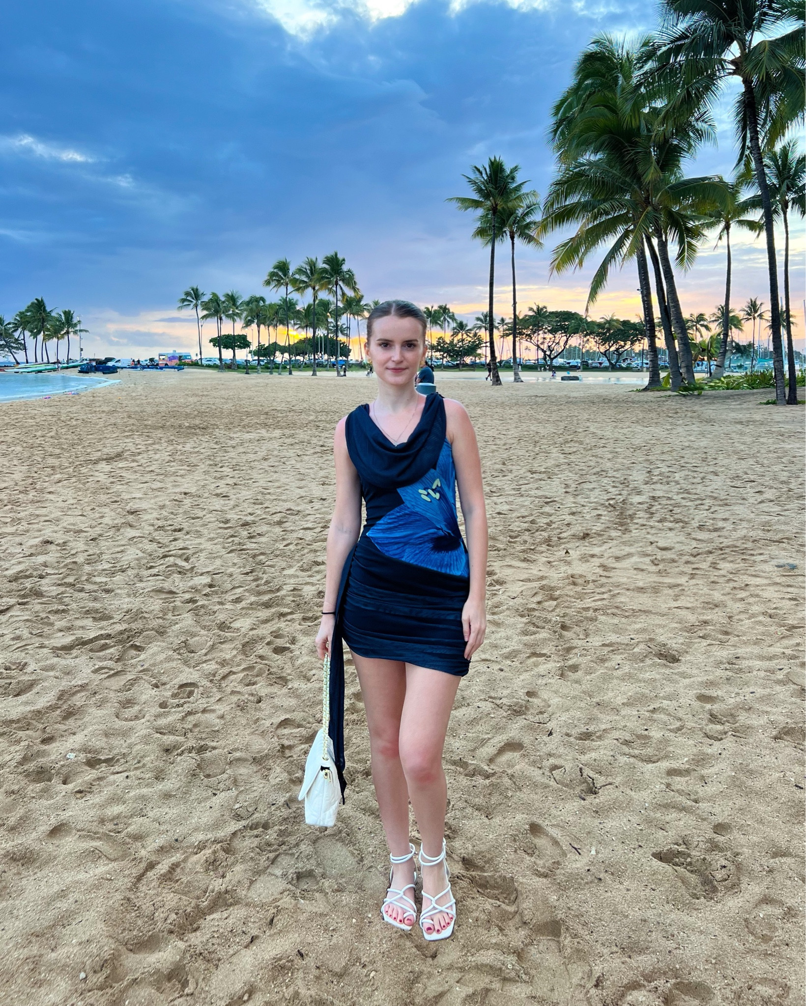 This floral print mini dress is perfect for dinner dates, or vacation nights. Styled with white strappy sandals, a chic shoulder bag, and floral hair clips for a romantic, effortless date night or resort wear outfit. 
.
.
.
.
.
Spring fashion | spring outfit | spring dresses | resort wear 2025 | vacation outfits | vacation dress | resort dress | dressy outfits | date night outfit | date night dress | dinner outfit | sandals 2025 | summer sandals | white sandals | evening bag | outfit inspo | outfit ideas | blue dress | 
#LTKSeasonal #LTKU #LTKSaleAlert #LTKPetite #LTKFindsUnder50 #LTKFindsUnder100 #LTKStyleTip #LTKTravel #LTKShoeCrush #LTKItBag 