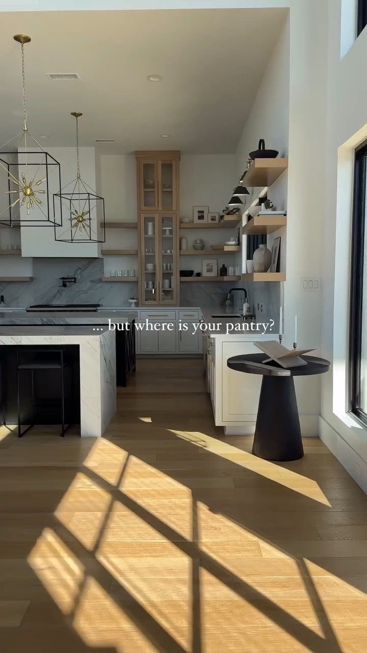 Here she is!

Located right behind the kitchen, this is where we store small appliances, house our coffee and wine bars, and organize dried food on storehouse shelving. We also added extra storage for serveware and hosting supplies.

With 12-foot ceilings, we took the cabinetry and shelving all the way up for maximum storage.

If you have specific questions, drop them below.

#homeinspo #homeinspiration #homeblogger #homedesign #neutralhome #ltkhome #neutralstyle #homedecor #modernhome #ltkvideo #butlerpantry #pantryorganization #pantrydesign #pantrygoals #laundryroom #laundryroomdesign

#LTKWatchNow #LTKHome #LTKSaleAlert