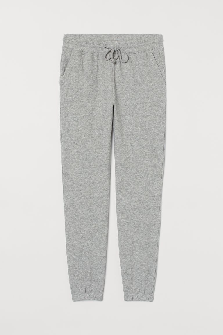 Sweatpants with an elasticized drawstring waistband, side pockets, and ribbed hems. Soft, brushed... | H&M (US + CA)