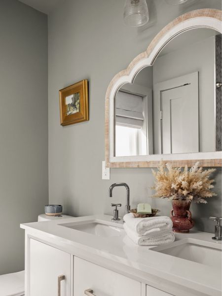 A large mirror can make a small en suite feel larger than it is!

#LTKhome