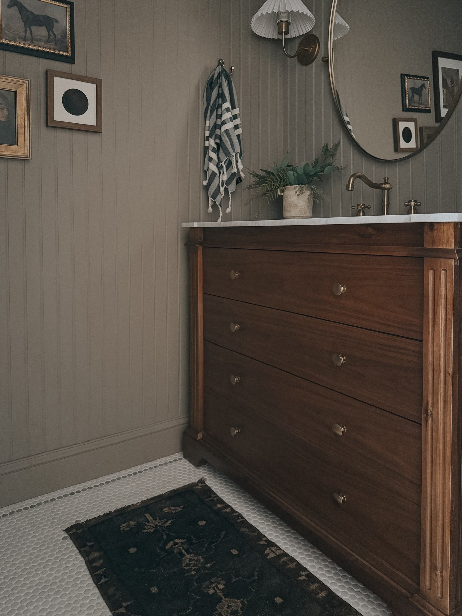 Still a favorite project 😍 

Links ⬇️ below 

#bathroom #bathroomfaucet #bathroomredo #remodel #bath #shower #tile #vanity 

#LTKHome #LTKselfcare #LTKvlog