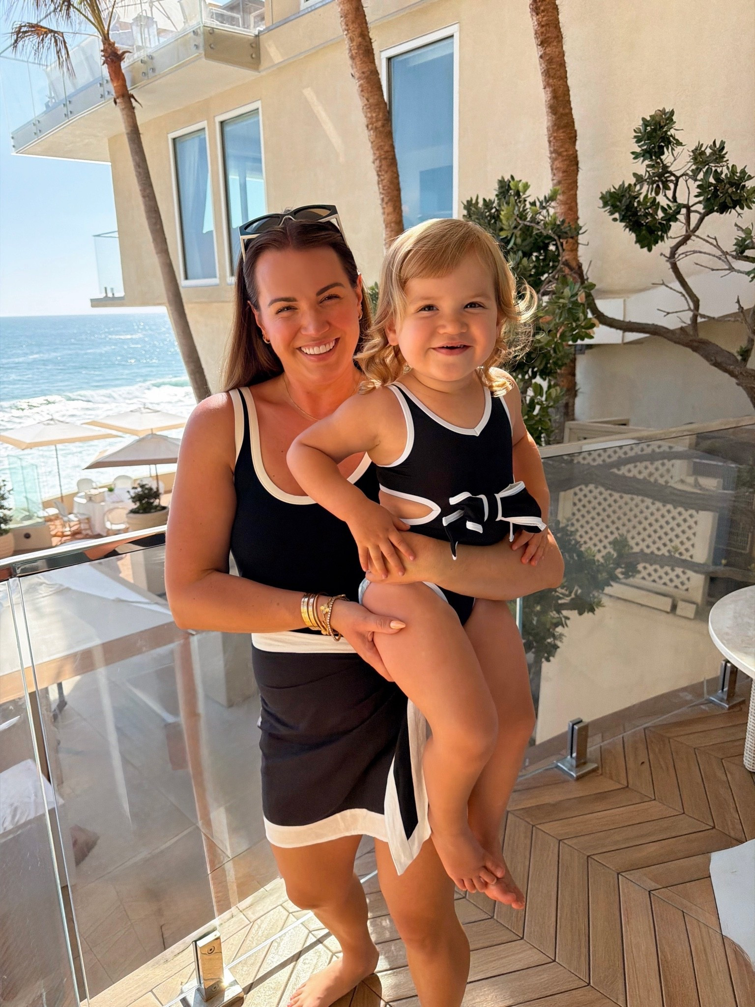 mommy and me coordinating swim suits! wearing size large in my black and white one piece and size medium in matching sarong. S is in the size 3T in her suit and it’s on major sale!

#LTKSwim #LTKKids #LTKMidsize