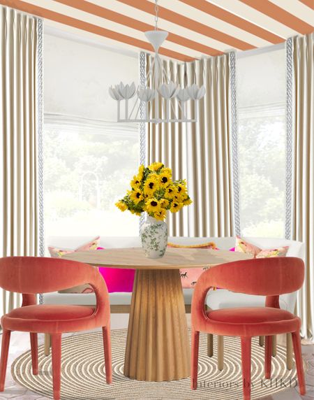 This cozy and chic breakfast nook is absolutely the place where you want to start your mornings in a cheerful mood thanks to rich-toned furnishings and barbie core-inspired pillows. The creamy white linen drapes, the crisp white dining banquette and the hand-braided jute/cotton rug ground the space with calming elegance. We wallpapered the ceiling to add a little bit drama and fashion-forward vibe. #diningroom #falldecor #barbiecore

#LTKFind #LTKSeasonal #LTKhome