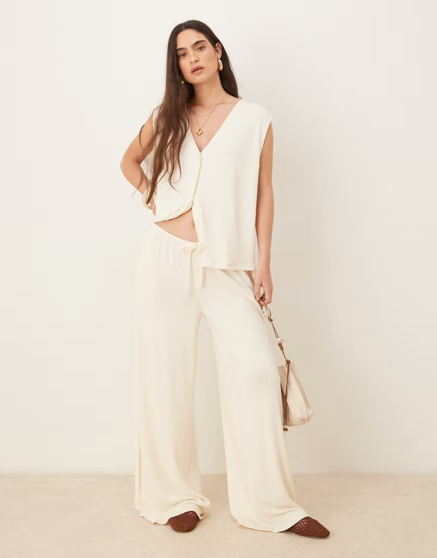 ASOS DESIGN textured knit wide leg pants in cream-White | ASOS (Global)