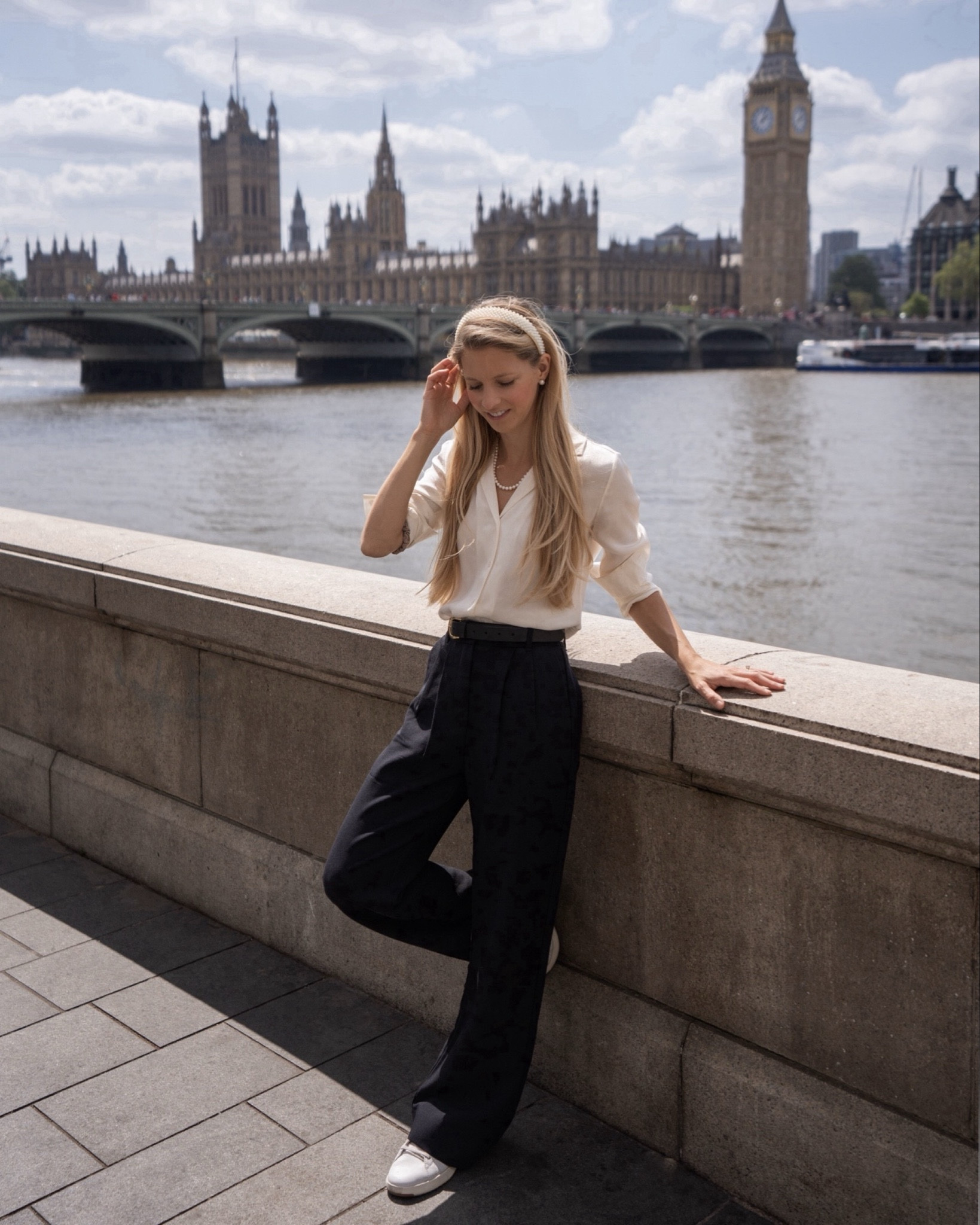 Fall outfit - Travel outfit - Europe outfit - London Style - trousers  & cream silk top makes the perfect classic outfit. Add a pearl headband and necklace to elevate the look even more. 

Also, these Cole Haan tennis shoes are an absolute must for no matter where you are traveling. You can walk forever in them and they go with everything: shorts, dresses, pants, skirts you name it!

Easy for travel Keep it casual or dress it up.

Pair it with a classic trench coat and your favorite bag.

I go one size up in the Abercrombie Sloan Pants

Travel outfit, spring outfit, summer outfit, silk top, silk button down, feminine style, black pants, black trousers, wide leg pants, travel style, summer outfit, spring outfit, fall outfit, rainy day outfit, Europe outfit, classic style, what to pack for Europe, London outfit, European style, what to wear in London, United Kingdom, pearls, what to wear in Europe, chic style, timeless, preppy, what to pack, Europe vacation, Parisian style, French style

#LTKStyleTip #LTKTravel #LTKShoeCrush