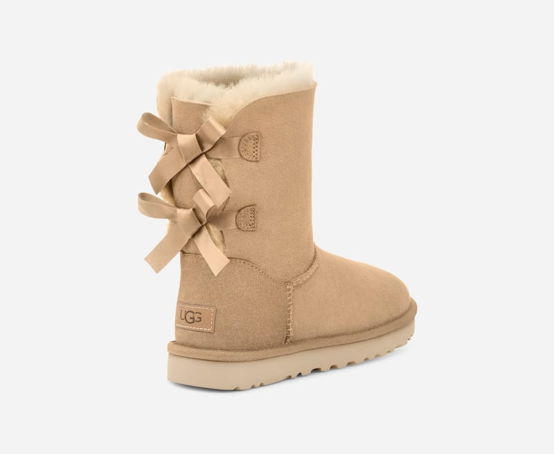 UGG® Women's Bailey Bow II Boot Sheepskin Classic Boots in Mustard Seed, Size 8 | UGG (US)