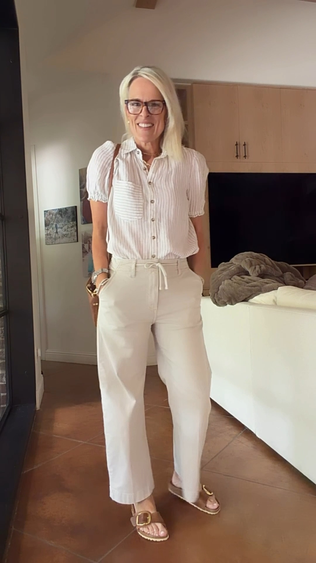 Spring outfit. Spring & summer linen top with sleeves 
Too fit - tts small
Pants - fit tts

Lipstick color - honey love
Gloss color- crème brûlée ￼

These drawstring khaki pants are a premium brand and are a bit pricey, I am linking similar looks at different price point as well. 
I’ve links LOTS of other cute spring tops too that would work with this look 

@Anthropologie 

￼

#LTKOver40 #LTKdayinmylife #LTKootd