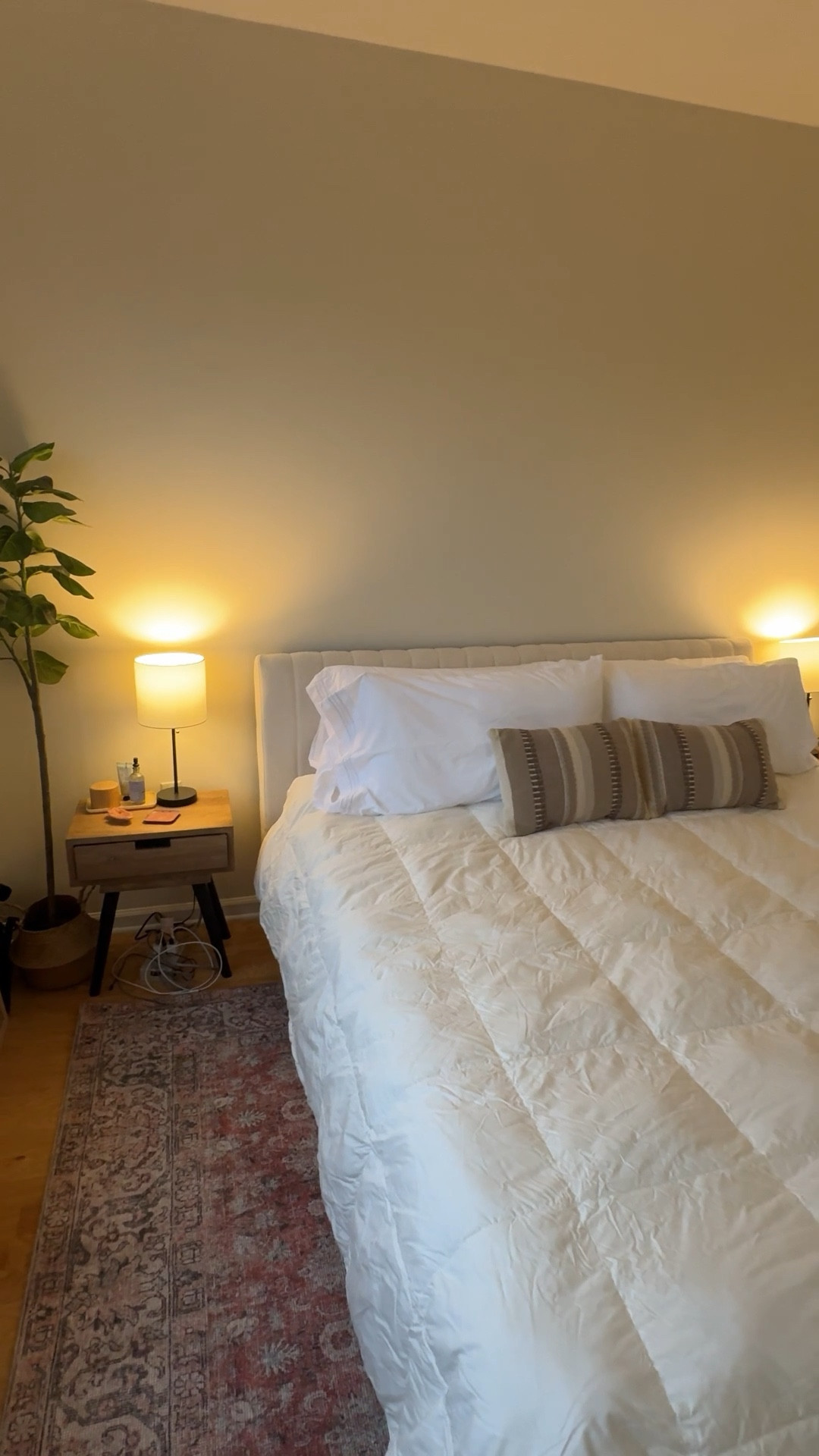 Presenting: our new bed setup! I’m so excited that we finally upgraded from a queen to a California King 👑 here is exactly what we got:

- Nectar Sleep California King Claremont Bedframe in Linen 
- Lull Premium California King Mattress
- SafeRest mattress protector
- CGK Unlimited California King 6-piece sheet set in white (4 pillowcases)
- Beckham Hotel Collection king size pillows 
- Rugs USA Westfield Antiqued Jute-Blend Rug in Orange
- Throw pillows from Target (linked some similar ones)

I’m really happy with how it turned out so far! I will probably get the sheets in another color for more contrast but it’s hard to go wrong with white and then I would love to get a blanket to fold at the end of the bed. 