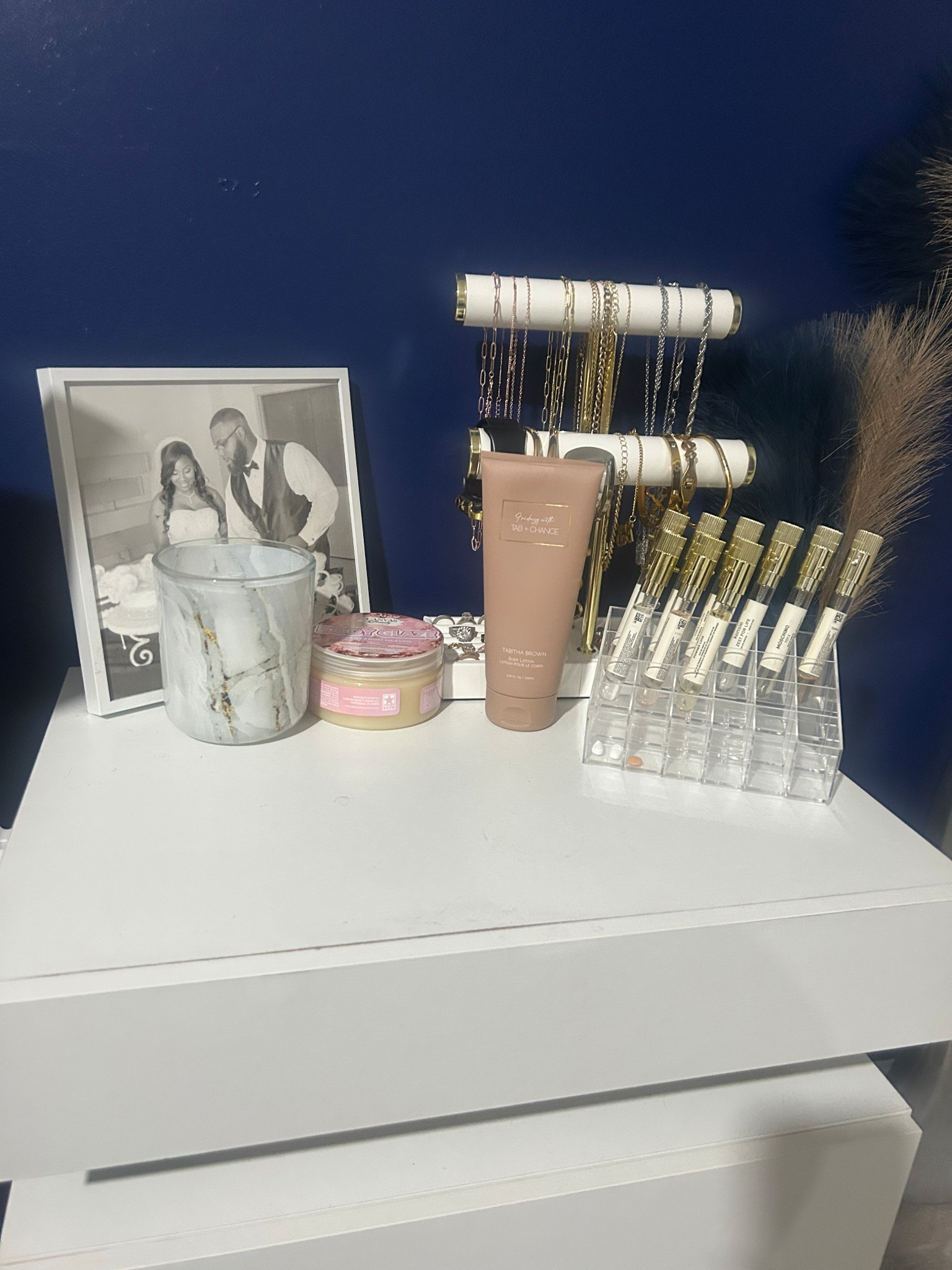 A little look at my favorites corner 🤍✨  

This nightstand has become one of my favorite pieces in my space. It keeps all of my everyday essentials right where I need them… my favorite jewelry, perfumes, lotion, and body butter all within reach.  

The best part is how functional it is. The two spacious drawers give plenty of room for storage, and the LED lighting adds such a soft, elevated touch at night. I also love that it has USB C, USB A, and side outlet plugs, which makes charging and keeping everything close by so convenient.  

Practical, pretty, and perfect for everyday use.

#LTKselfcare #LTKHome #LTKmomlife