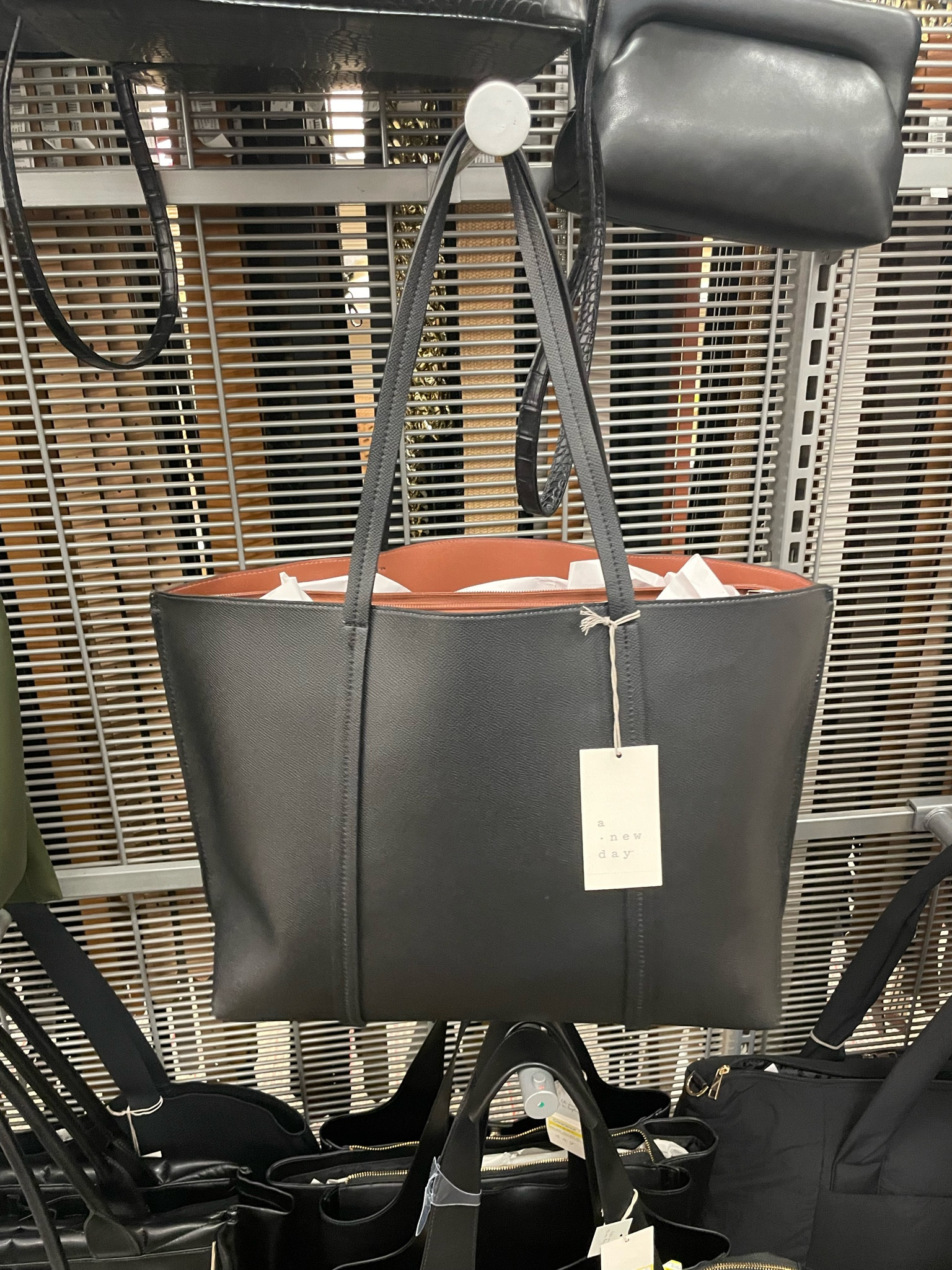 The perfect work bag! It has a middle zip up pocket, and two open side pockets. It can fit your laptop, as well as papers that will never be graded. 😅✏️ Comes in 3 colors.

#LTKFallSale #LTKItBag #LTKBacktoSchool