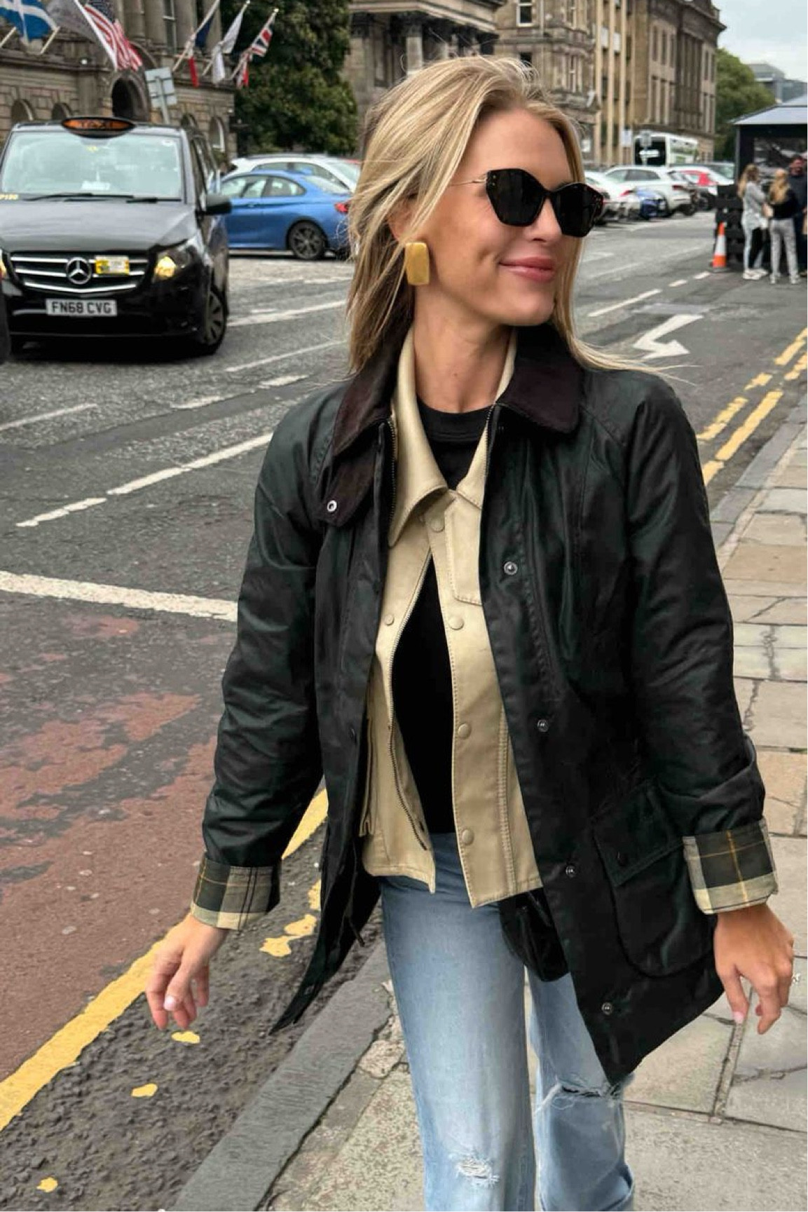 Shop Madison LaCroy 's  wax jacket crop trapeze jacket, straight leg distressed denim jeans 

#LTKStyleTip