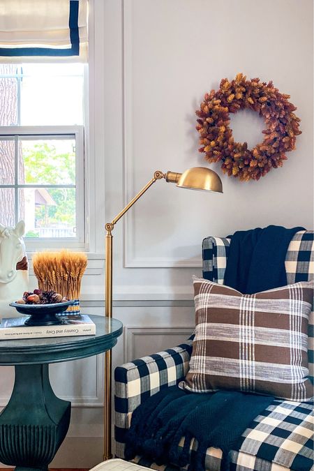 Fall living room decor // wingback armchair, fall wreath, Target wreath, brass floor lamp, round side table, ottoman with storage

#LTKSeasonal #LTKhome