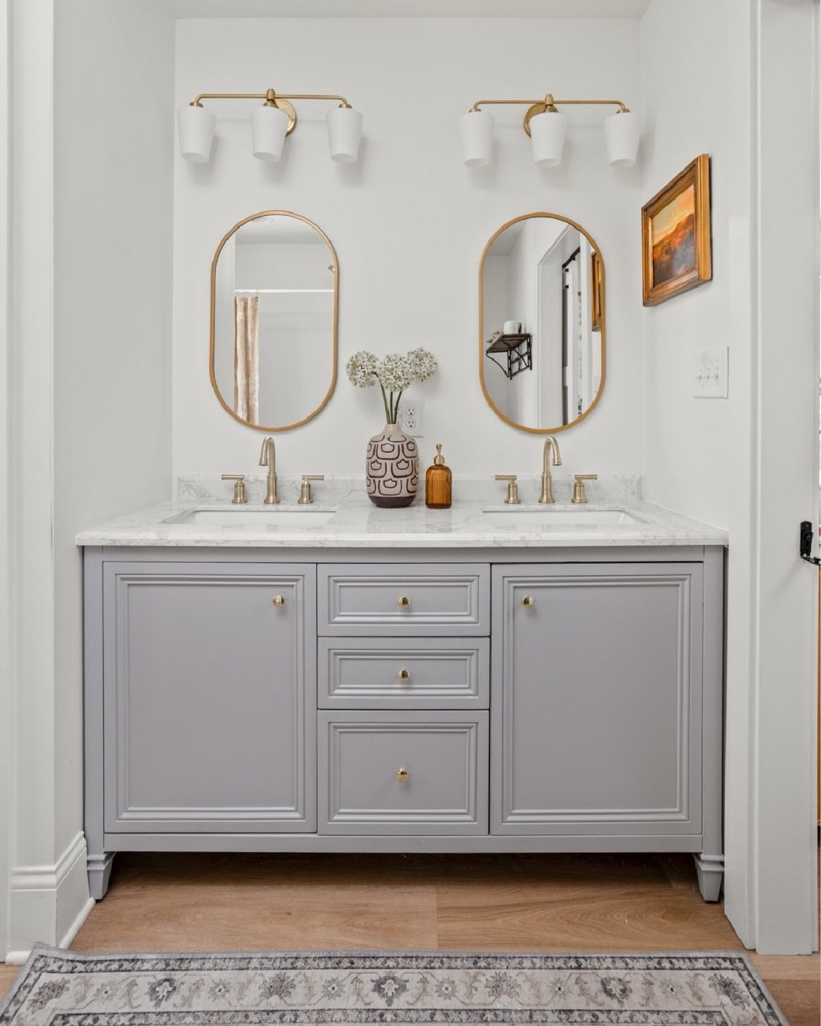 A peaceful bathroom to coordinate with the rest of the studio.

#LTKhome