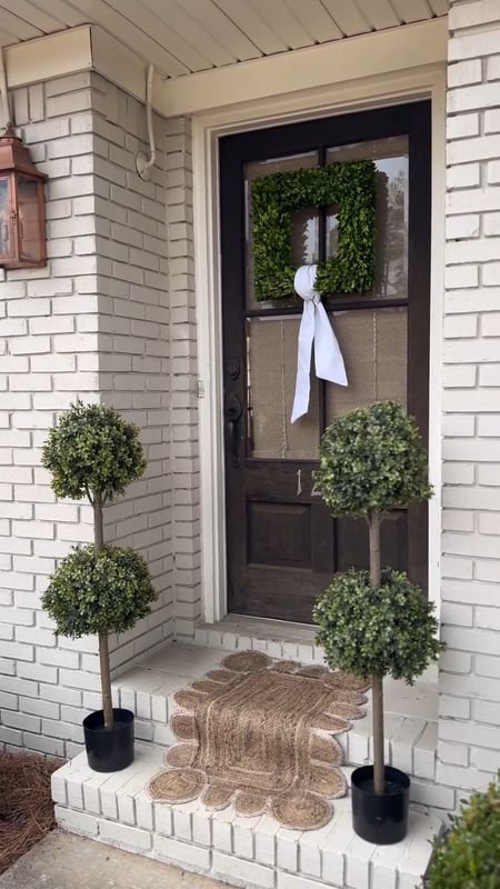 Spring front porch refresh! 👏🏼

These faux boxwoods are AMAZING ) instantly added so much charm to our front porch. On sale right now!

The boxwood wreath on my door is real & I hesitate to give it a raving review because of how messy it is.
Maybe I was supposed to treat/preserve it?! Green coloring rubs off and sap falls. Other than that, it's gorgeous. I also own a faux version that's about an inch smaller - I'm linking for you as well. Find them all, along with the sash linked for ya! 

#LTKfindsunder100 #LTKfindsunder50 #LTKhome