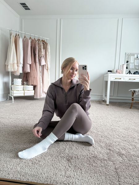 This lounge set from Spanx is so comfy for a casual day at home. I’ve paired the AirEssentials Half Zip with the Booty Boost leggings and cozy socks  