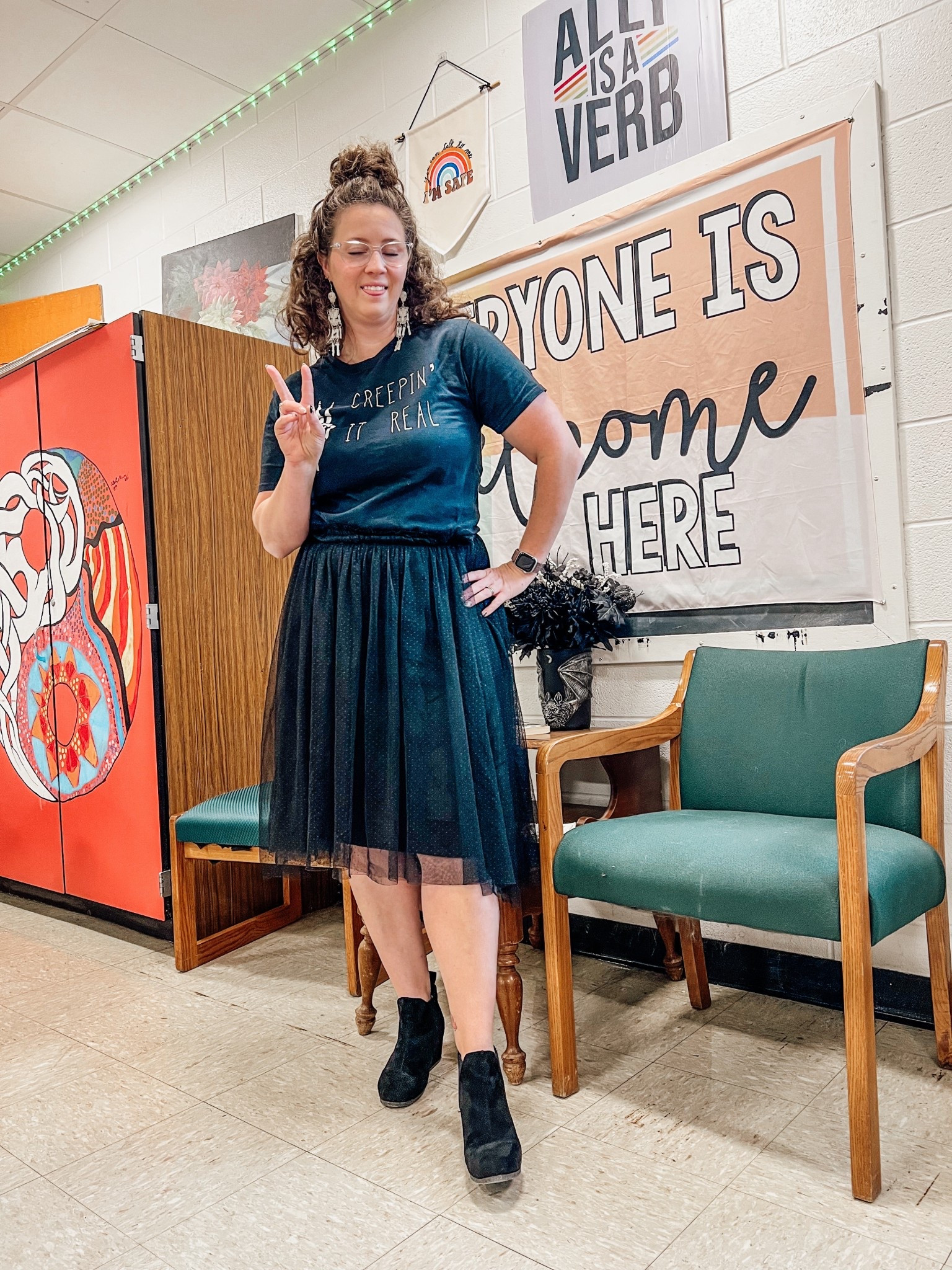 Day 30 ✔️

Very much in my spooky era. My MIL was a teacher and passed these glow-in-the-dark skeleton earrings to me 😍

English teacher ootd 

#LTKMidsize #LTKWorkwear #LTKFindsUnder50