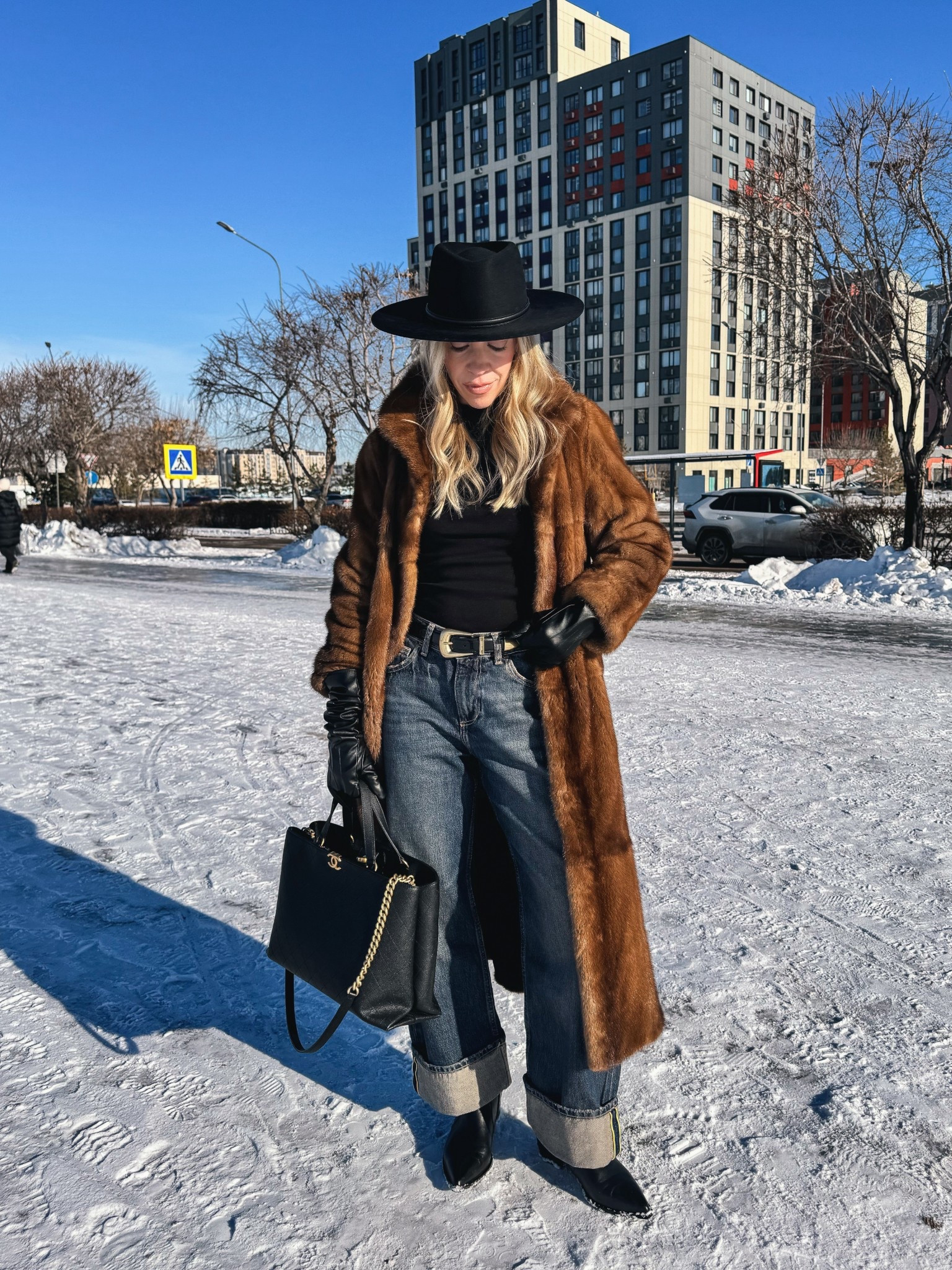 Brown fur coat, @Zara dark wash cuffed baggy jeans, @Janessa Leone black wool fedora hat, western style winter outfit 

#LTKSeasonal #LTKSaleAlert #LTKOver40