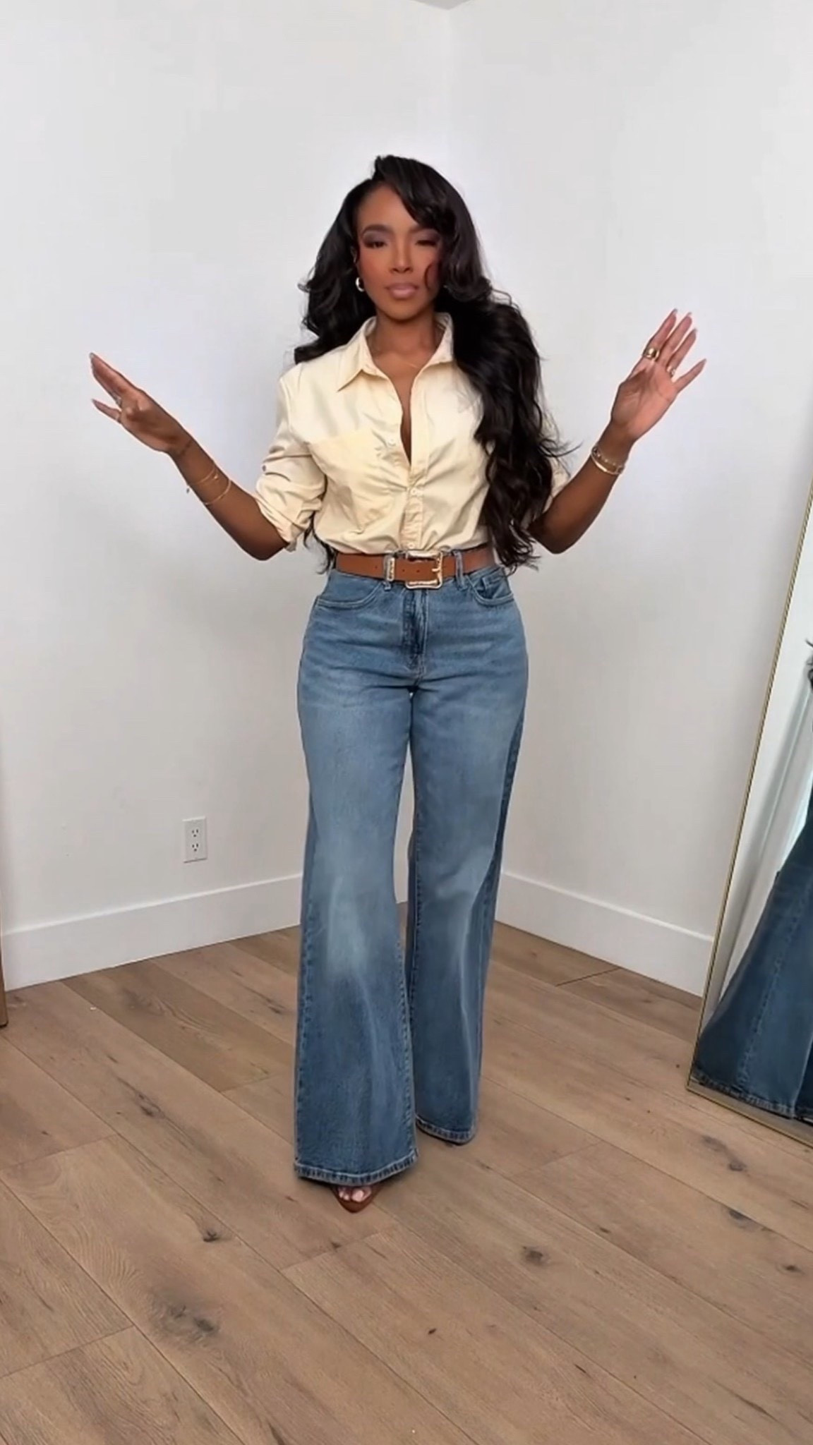 Soft neutrals done right — this look is all about effortless polish with a flattering, everyday fit. The structured button-down paired with relaxed wide-leg denim creates that elevated-casual balance that always works. Easy to dress up or down, and a true closet staple you’ll reach for year-round.

Perfect for casual workdays, brunch, errands, or everyday chic moments.

📏 Sizing:
Top: Size Small  
Jeans: 27 Long  
Height: 5'4"  
Weight: 138 lbs  
Bust: 34D | Waist: 27" | Hips: 40"

This outfit is a long-term shopping strategy — classic pieces styled multiple ways so your cost per wear drops with every outfit repeat. Save this post to recreate it later.

Neutral outfit inspiration, classic button-down outfit, wide leg jeans outfit, everyday chic style, elevated casual look.

Follow me on Instagram and YouTube @kiras