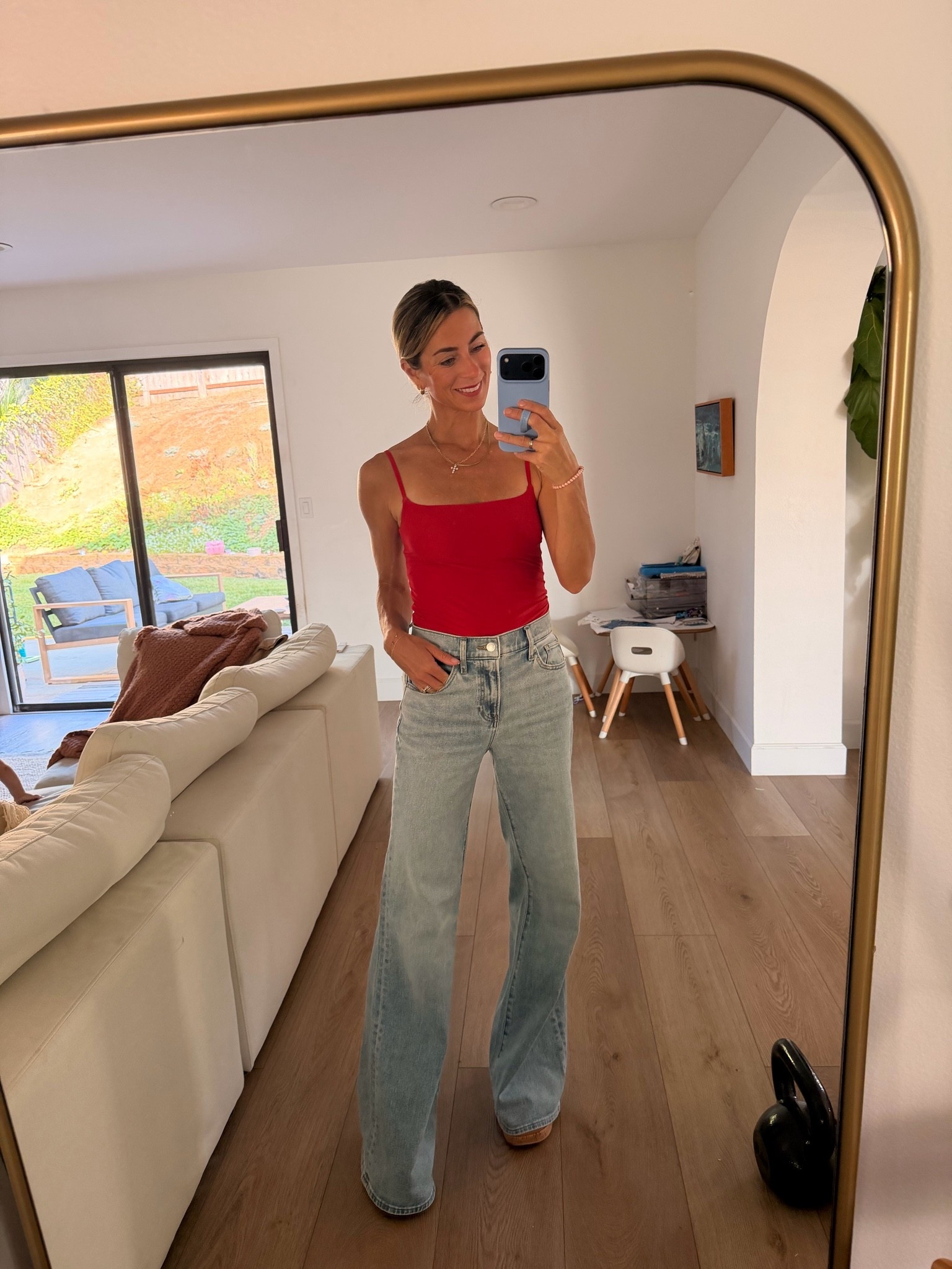 These jeans though 😍 The wash + wide leg fit are SO good. They’re high waisted, super flattering and have that perfectly relaxed fit without feeling too oversized. I’m wearing a 2R — they’re a little loose on me, but I actually love how they fit.

Paired them with one of my favorite Abercrombie built-in bra tanks (no bra needed 🙌🏼) + my REEF wedges that I’m obsessed with. And if you only think of REEF for flip flops… they make SO many cute women’s shoes + great men’s shoes too!

Linking everything + a few more of my favorite built-in bra tanks 🤍

Search words: Express jeans, Express wide leg jeans, high waisted wide leg jeans, light wash jeans, flattering jeans, women’s denim, Abercrombie tank, built in bra tank, no bra tank top, red tank top, REEF shoes, REEF wedges, platform wedges, casual summer outfit, everyday outfit, mom style

#LTKootd #LTKOver40 #LTKgrwm