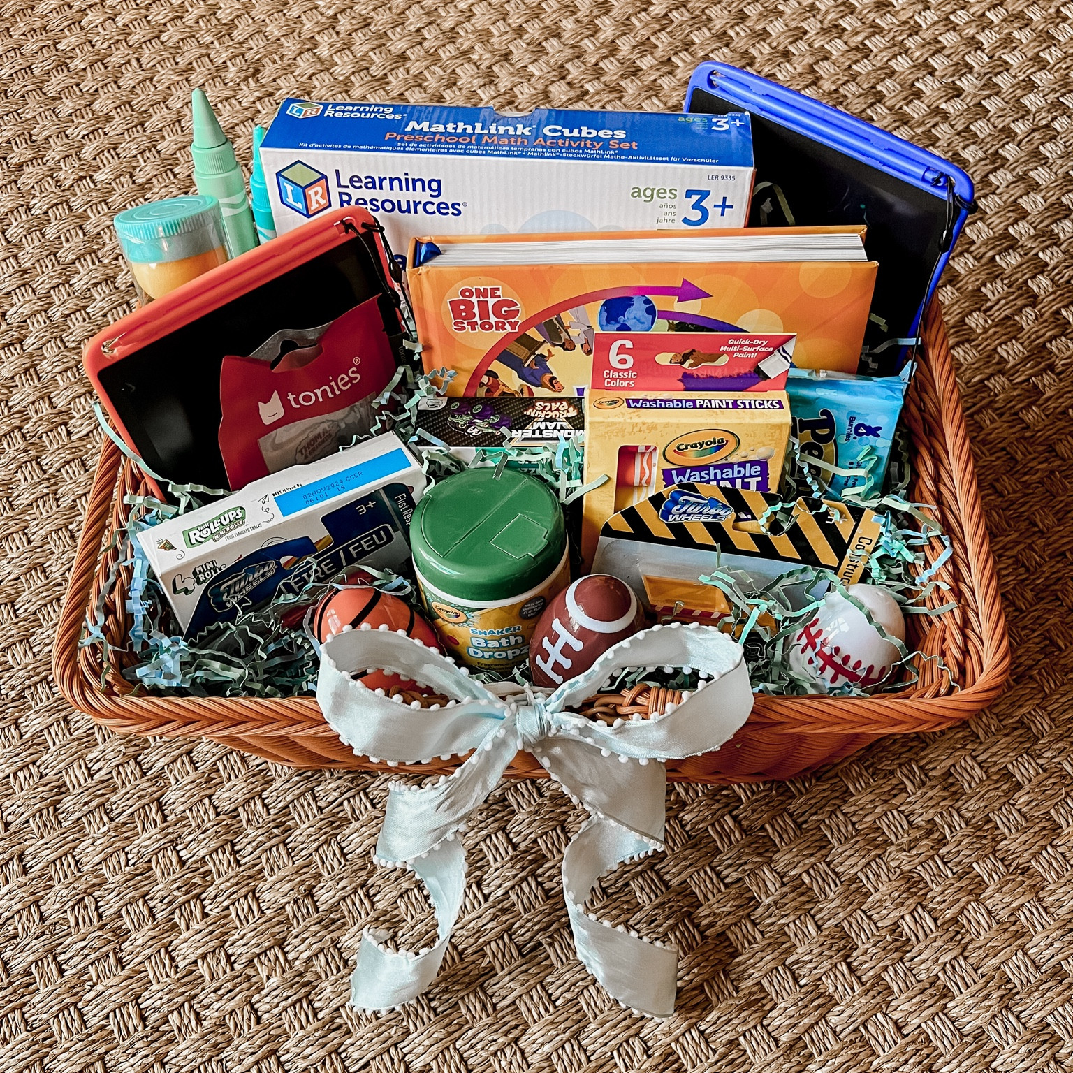 Shared easter basket for toddler boys!

I am all for no frills and minimal junk, so we got things that our boys actually like to play with and that were already on our lists for gifts and starting homeschooling in the fall. I'd much rather focus on quality over quantity!!

With our oldest two being so close in age and sharing most everything, we decided to do a larger basket this year instead of one for each kiddo! We also plan to use the basket for other holidays and gifts, and this faux wicker looks super realistic while being more durable! 

I'm linking everything I got from Amazon and Walmart, but I also got some smaller items from the Dollar Tree!

large wicker easter picnic basket | toddler homeschool learning gift | amazon no mess writing pad set of two | thomas the train tonie box topper | gospel centered storybook bible for toddlers | crayola tempera paint sticks | crayola fizzy bath color tablets | color changing sticky washable sensory stress balls

from Dollar Tree: monster jam toddler puzzle | fire rescue matchbox cars | construction hot wheels cars | crayola bath crayons | fruit roll ups | peeps easter candy | sports themed easter eggs

#LTKSeasonal #LTKkids #LTKfamily