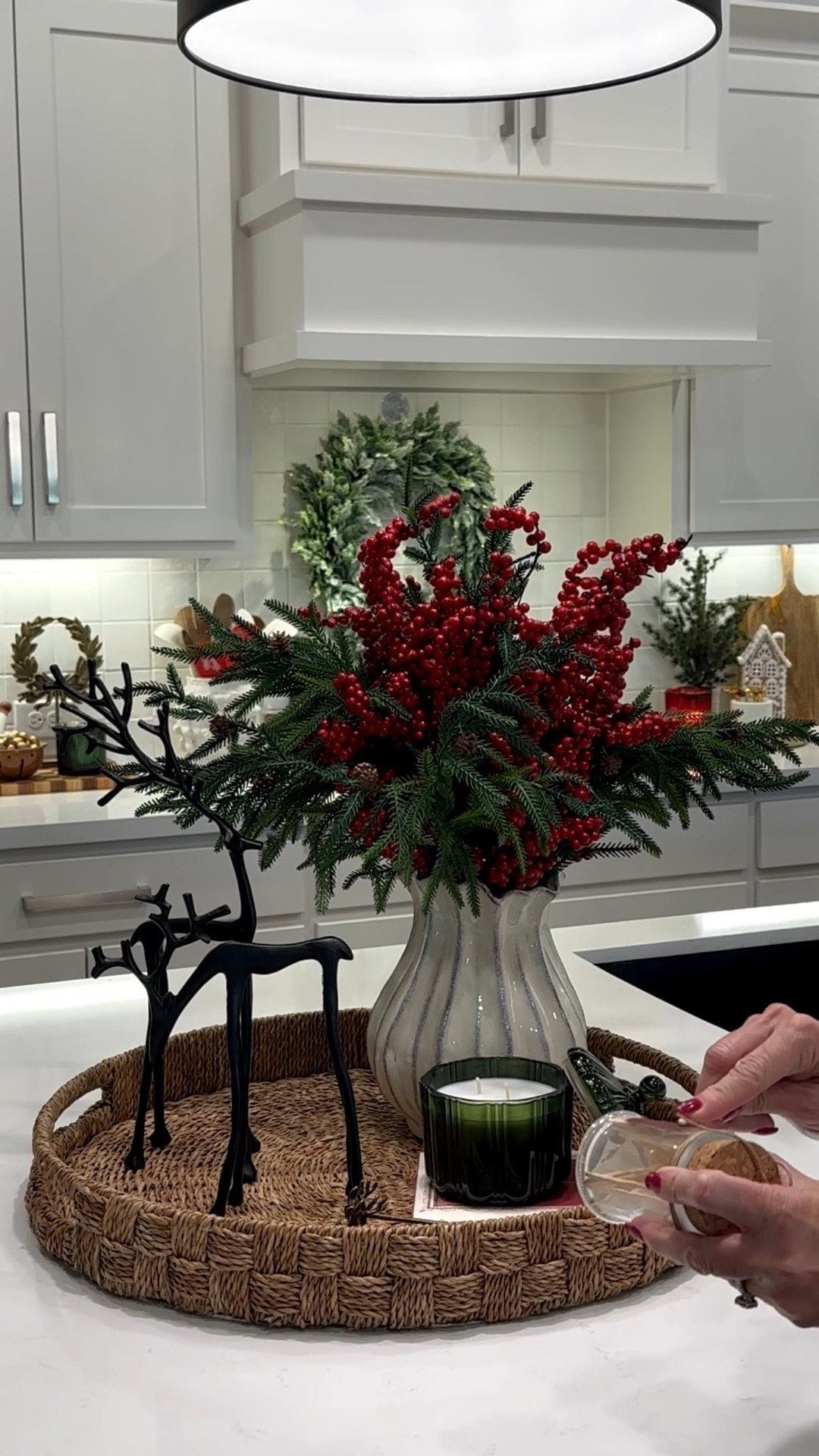 Here’s an easy way to style a holiday tray that instantly makes any space feel festive and pulled together! I started with a simple vase filled with pine stems and holiday red berries for that classic pop of greenery and color. Then I added a cozy candle, a cute reindeer accent, and a Christmas book to bring in warmth, texture, and a little seasonal charm.
It’s the perfect mix of decor that feels intentional, effortless, and totally welcoming — style it on your coffee table, kitchen counter, or entryway for an instant holiday moment.

#LTKHome #LTKSeasonal #LTKHoliday