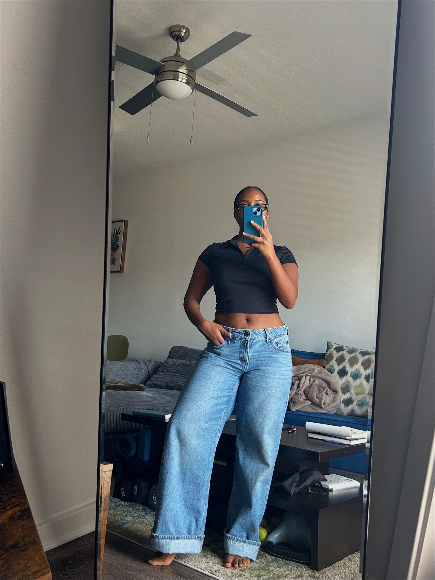 Casual Friday WFH outfit of the day! Love this short sleeve zip up and loose jeans. Jeans are from Levi’s and I’m wearing a size 29 x 30L. I gave them a wide cuff bc she’s a 5’2 girlie lol 

#LTKPetite #LTKFindsUnder100 #LTKootd