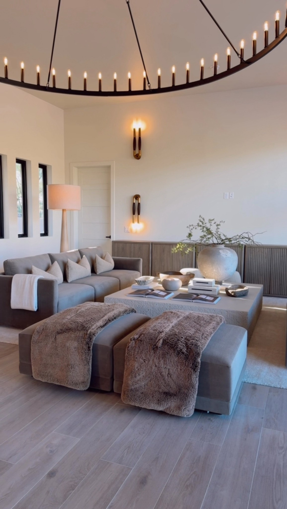 Still so in love with how this space is slowly coming together. I wanted to add  the low-profile sofas, textured ottomans, and faux fur throws bring in so much warmth while keeping everything clean and simple.😍

#neutralinteriors #modernlivingroom #cozyhomevibes #earthydecor #warmminimalism


#LTKStyleTip #LTKHome