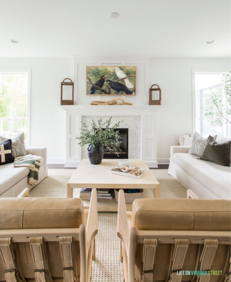Decorating our living room for fall is always so much fun! We went with some nice neutral green and black accents to bring in a little bit of color against the cream slip covered linen sofa and our tan leather chairs. I’ve also styled this room with wood lanterns, a wood chain link, a bead garland, and a seagrass basket. And I changed our Samsung Frame TV picture to these crows to help add to the fall decor! 

simple decor, home decor, fall decor, fall decorating ideas, amazon fall decor, fall home finds, fall pillows, target fall finds, living room decor, amazon home, amazon fall finds, pottery barn sofa, pottery barn decor, pottery barn inspired living room, pb inspired, studio mcgee, fall living room, fall design, target finds, target home, neutral coastal design

#LTKfamily #LTKunder50 #LTKunder100 


#LTKhome #LTKSeasonal #LTKstyletip